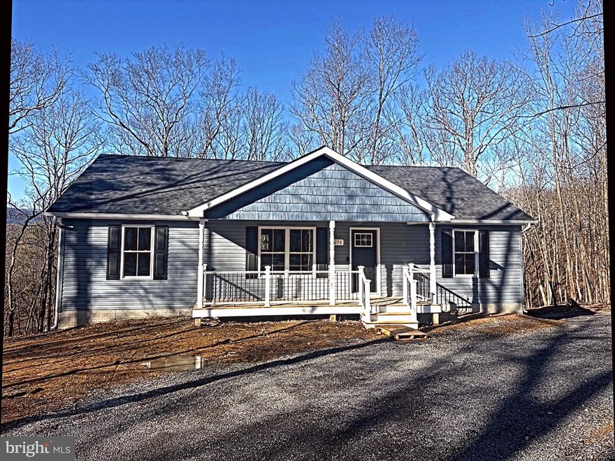 256 Roundtop Lane offers the balance many buyers are looking for — privacy, modern construction, and practical living space in a peaceful setting. This new-construction home features 4 bedrooms and 3 full baths on over 2.5 wooded acres, providing a quiet backdrop with room to spread out while still being manageable.
The interior layout is open and functional, with neutral finishes that create a clean, timeless feel. The kitchen includes granite countertops and Whirlpool appliances and connects seamlessly to the main living area, making it well suited for both daily living and hosting. Spacious closets with built-in systems, a dedicated laundry room, tankless water heater, and lifetime shingles reflect thoughtful planning and quality construction throughout.
The primary suite includes a heated bathroom floor for added comfort during cooler months. A sunroom overlooking the woods provides additional living space and a natural connection to the outdoors. The finished basement offers flexibility for a family room, office, workout space, or guest area, with direct walk-out access to the backyard. Expansive decks extend the living space outside and take advantage of the wooded surroundings. Low HOA fees add to the home’s overall appeal.
Located approximately 25 miles from Winchester, VA and about 100 miles from Washington, D.C., the property works well as either a full-time residence or weekend retreat.
$5,000 toward buyer closing costs is available with an acceptable offer.
If you are looking for a new home with privacy, quality finishes, and functional space, 256 Roundtop Lane is worth a closer look. Contact me to schedule a private showing.
Square footage and room measurements are approximate. Tax information will be updated as available.