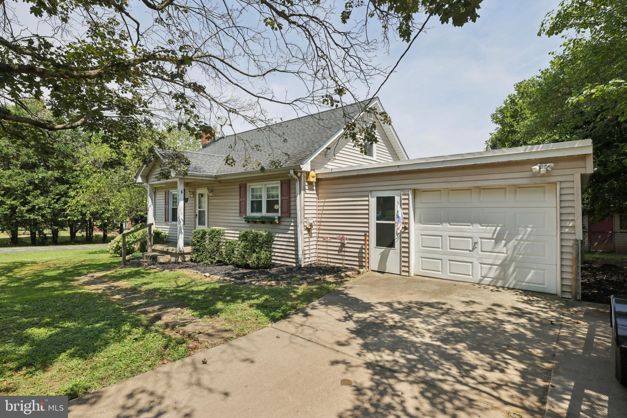 Charming Cape Cod nestled on a spacious fenced-in lot in Woodbine! This 3-bedroom, 1-bath home offers timeless character and everyday comfort. The property features a one-car garage with a recently replaced roof and a generous backyard complete with a cozy firepit—perfect for relaxing or entertaining. The fully fenced backyard offers privacy and plenty of room for pets, play, or gardening. The unfinished basement provides excellent potential for added living space, a home gym, or workshop. Whether you're looking to expand or enjoy as-is, this home offers a great opportunity in a peaceful setting.
