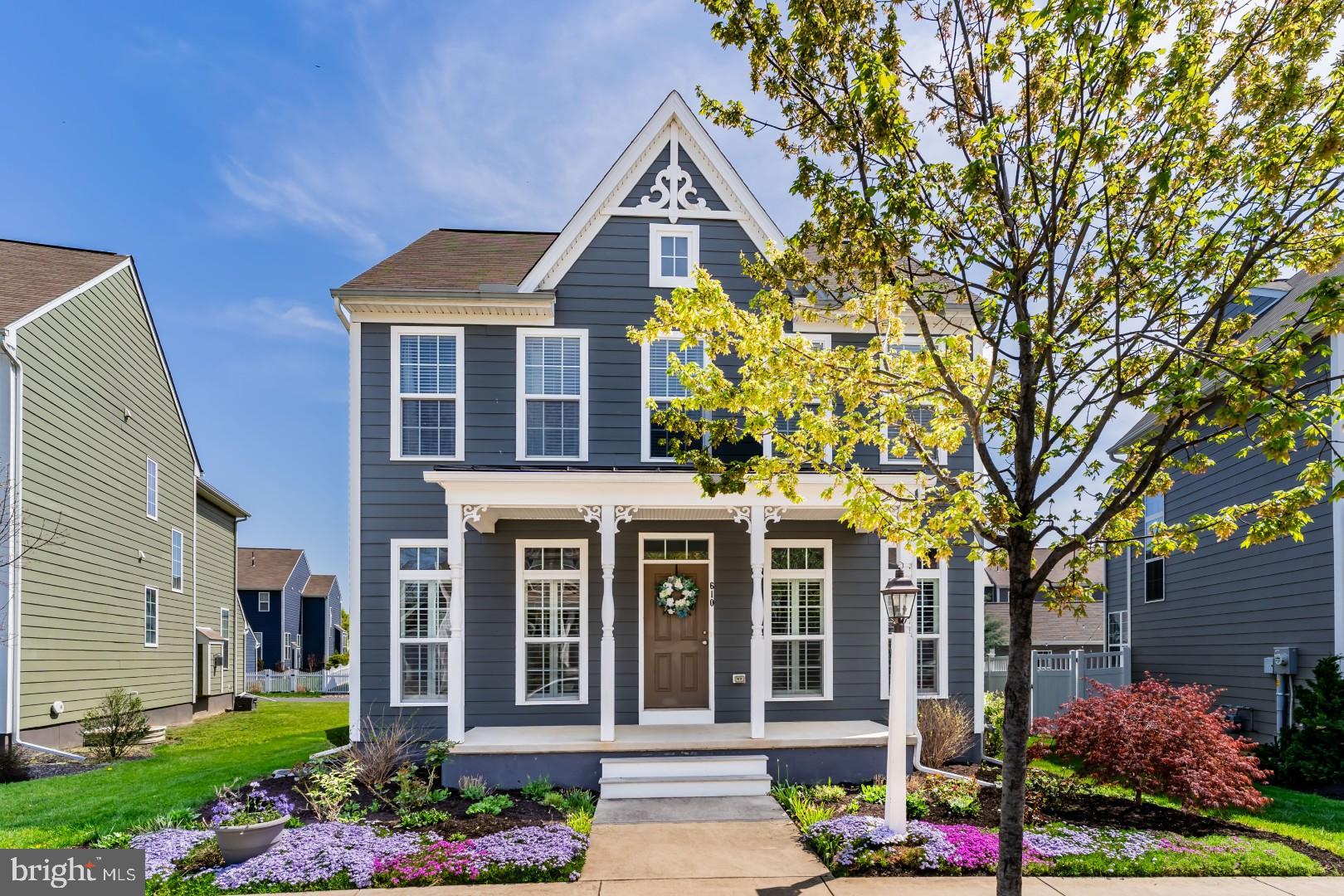 Welcome to this beautifully maintained home nestled in the sought-after Walden neighborhood, known for its tree-lined streets, walkability, and strong sense of community. Enjoy easy access to shopping, parks, restaurants and a vibrant community center featuring a pool, community room and fitness center. Step inside to find hardwood flooring throughout the first floor, complemented by soaring 9ft ceilings and abundant natural light. A dedicated office with hardwoods offers the perfect space to work from home. The heart of the home is a gorgeous kitchen boasting white cabinetry, quartz countertops, a tiled backsplash, gas cooking, a spacious island, pantry, and recessed lighting—ideal for both everyday living and entertaining. Cozy up in the inviting living area featuring a gas fireplace with an accent wall and stylish plantation shutters. Upstairs, the generously sized primary ensuite includes a walk-in closet and a serene, private bath. The home is equipped with two zones for heating and cooling for year-round comfort. Outside, enjoy a fenced-in, landscaped yard complete with a stone patio and built-in fire pit—perfect for gathering with friends and family. A quaint front porch adds charm and curb appeal, while the 2-car attached garage with 10ft+ ceilings provides ample storage and convenience. Solar panels on this home are on a Power Purchase Agreement. This home truly offers the best of comfort, style, and community living.