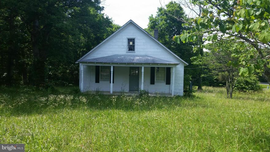 INVESTOR's SPECIAL!  GREAT POTENTIAL FOR PROFIT! Located in Duvall Subdivision. The lot-parcel currenlty has an old single-family home sitting on it, built in 1960 which has  2 beds and approximately 1,248 square feet. Property has been perched for 3/1. Approved plans for septic, abandoned well and utilies are not in.