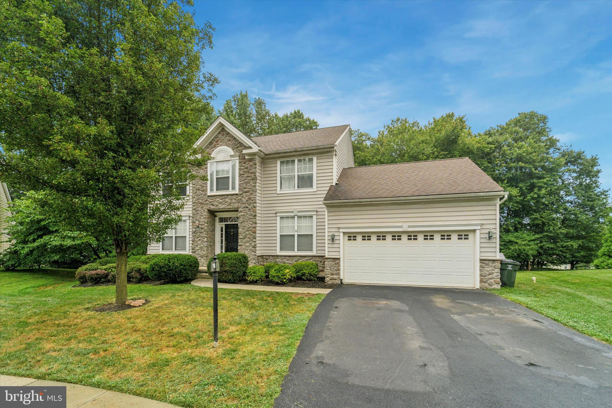 2940 Avebury Stone Circle is located on a peaceful cul-de-sac in Downingtown, this beautifully maintained Colonial offers the perfect blend of privacy, comfort, and style. Backing to a wooded backdrop, the home provides serene views and a bright, open atmosphere throughout.
Step inside to find a thoughtfully designed main level with hardwood floors that flow seamlessly from room to room. The chef’s kitchen is the centerpiece of the home, boasting a center island, tile backsplash, double ovens, and plenty of space for gathering. A formal dining room with classic millwork sets the stage for memorable meals, while the family room—complete with a gas fireplace—invites cozy evenings in. Natural light floods the living spaces, and sliding doors lead to an expansive deck overlooking the private backyard. For everyday convenience, the first floor also offers laundry and direct access to the 2 car garage.
Upstairs, the primary suite is a true retreat, featuring a generous bedroom, walk-in closet, and a spa-inspired bath with dual vanity, soaking tub, and separate shower. Three additional bedrooms and a full bath provide versatility for family, guests, or home office needs.
The finished walk-out lower level extends the living space with a large recreation room, custom built-ins, a dedicated office nook, extra storage, and a full bathroom. Outdoor living is just as impressive, with a spacious deck, stone patio, and landscaped grounds—perfect for entertaining or relaxing in peace.
Additional highlights include a stone façade, gas line for grilling, and an oversized two-car garage. Recent upgrades include A/C Unit - 2020, Furnace – 2023, Sewage Ejector Pump – 2024, Gas Water Heater – 2025, Gas Stovetop – 2025, Electric Double Oven – 2025
Ideally located near shops, dining, the train station, and major routes, this home offers both tranquility and convenience.
Sellers are looking for a flexible settlement to find their new home.
Showings start 8/22. Open House 8/24 from 12 to 2.