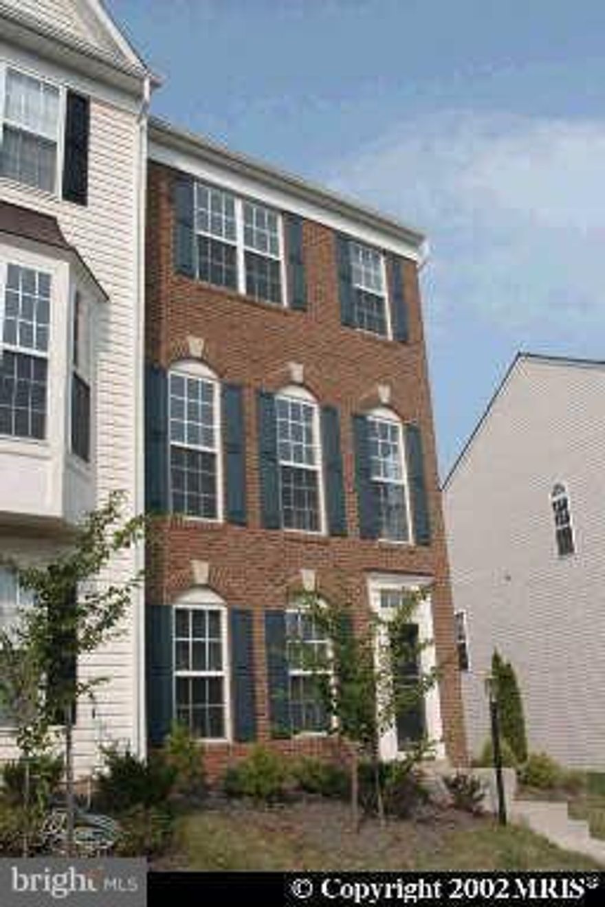 Brick front end unit Town Home. Huge Kitchen with Center island, Breakfast nook and kitchen table space. Gleaming wood floors on main level and stairs. Large recreation room in lower level with 1 Bedroom used as 4th bedroom- full bath in lower level. Fully fenced in rear yard. Spacious Master with walk-in closet and luxury bath.