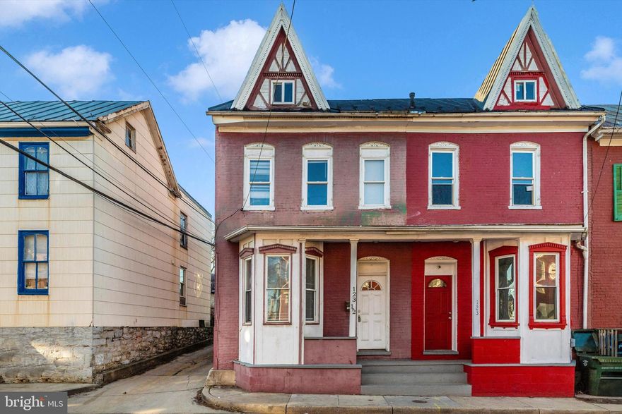 End unit townhome in Downtown Hagerstown for sale. Walk into your spacious foyer with hardwood flooring. Living room with a huge bay window giving lots of natural light. Kitchen with lots of cabinets & updated appliances. Huge dining room off kitchen. Upstairs you have 3 bedrooms and one full bathroom. Your owner's bedroom suite has a private balcony. Great size unfinished attic that could be a 4th bedroom or den.  Fence backyard. Located close to public transportation, shopping, restaurants and major highways.