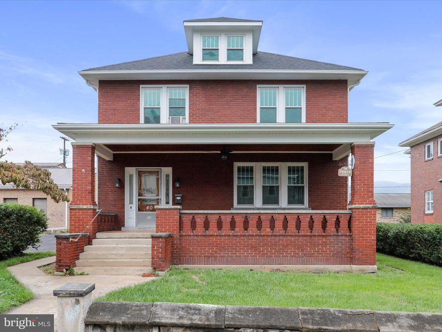 Welcome to 40 S Main--"The Refreshed Charmer". This lovely two-story brick home  has become a refreshed home with many updates! Outside you appreciate the large brick front porch, the new roof,  new fascia and gutters, the large two car garage with a workshop and hook up for a wood stove, off street parking and the lovely front and back yard perfect for playtime, cook outs and making memories. When entering the home, beyond the solid front door, you are greeted with the ongoing character and charm in the foyer, the large living room with a ton of windows, a beautiful fireplace and pocket doors! Under the updated LVP flooring lays oak flooring that continues throughout the home.  Through the French doors and into the dining room you can enjoy the built in corner cabinet and the tall ceilings before going into the updated kitchen! The Kitchen features new cabinets, butcher block counter tops, new stainless steel appliances, a disposal system and a deep farm sink! Upstairs is laid out with 4 large bedrooms all equipped with a ceiling fan and an updated full bathroom. Down the hall, which is lined with built-in and your laundry chute,  is access to your balcony overlooking your back yard! And before you leave the home, take note to the large full basement with work tables, a workshop, laundry, the laundry chute, and plenty of space for storage! This home has even more to offer so be sure to call to check it out! *Ask about the current A