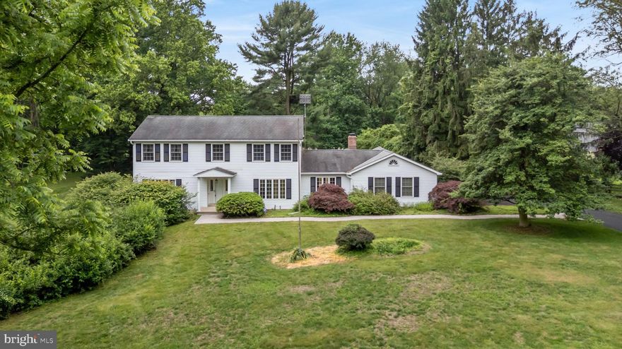 Welcome home to this classic Colonial located on a cul de sac. This nearly 2500 sq ft home features hardwood flooring on both the first and second floors. The spacious rooms are highlighted by Anderson windows that allow natural light to flood the home from every angle. The slate foyer has not one but two coat closets flanking the front door. The immense living room runs the width of the home. The front of the house is accentuated by the dining room complete with corner cabinets and a pocket door into the kitchen. The eat-in kitchen in the back of the home has gorgeous cabinets, two sinks, and an island. It opens into the family room with a brick fireplace and also to the jewel of this house: the stunning sunroom with sliders on all sides that open to the brand new deck. You'll live in this room that overlooks the serene backyard. The hardwood floors continue onto the second floor and flow through all four bedrooms. The primary room is completed by an en suite bathroom with a walk in closet along with another closet in the bedroom. The bathroom features a double vanity along with extra cabinetry for storage. The second floor is completed by a large linen closet and another full bathroom. 

A new septic system was recently installed. Add this home to your tour today!