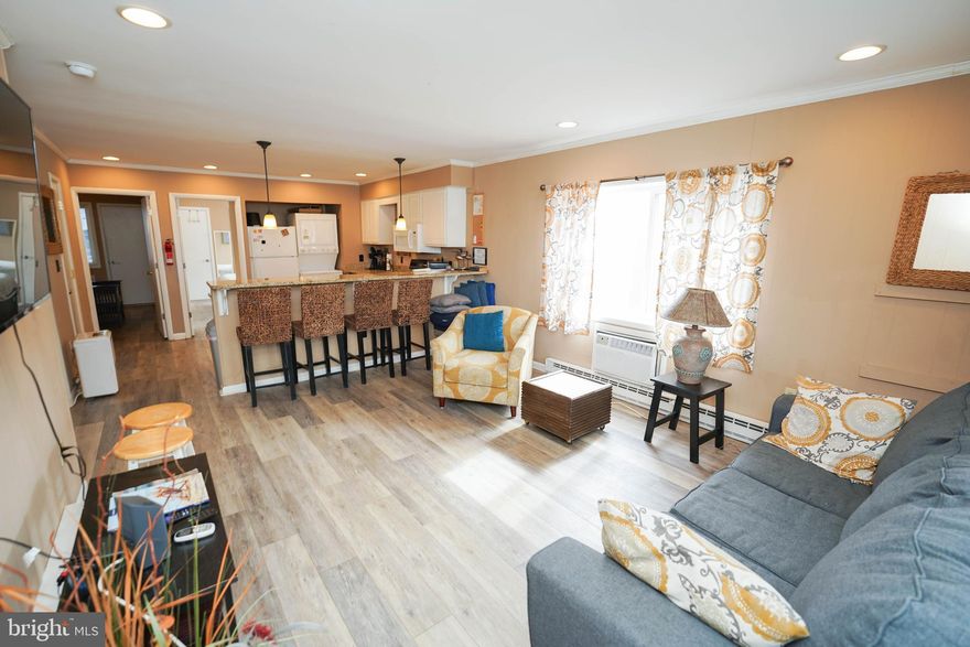 Ocean-block North OCMD -- Updated 3BR/2BA condo - 450' to the sandy beaches of the Atlantic!  LVP flooring throughout the wide open living, dining, kitchen spaces and bedrooms. Primary bedroom has a separate private entrance. Gorgeous granite counters in the roomy kitchen, which features the convenience of a laundry space. Severn 1 in Ocean City's beloved Uptown/North-End - close to everything - golf, amusement parks, water sports, world-class dining, and unique shopping. Speaking of shopping - only half-mile to the Delaware Beaches' tax-free shopping! 1mi to the incredible Northside Park - 50+ acres of public space - 2 piers, jogging/walking paths, baseball and soccer fields, playgrounds. Head Downtown for more adventures - experience the Ocean City Boardwalk - full of activity day + night during the summer; perfect place for a calming stroll in the other seasons. Sizes, taxes, distances are approximate.