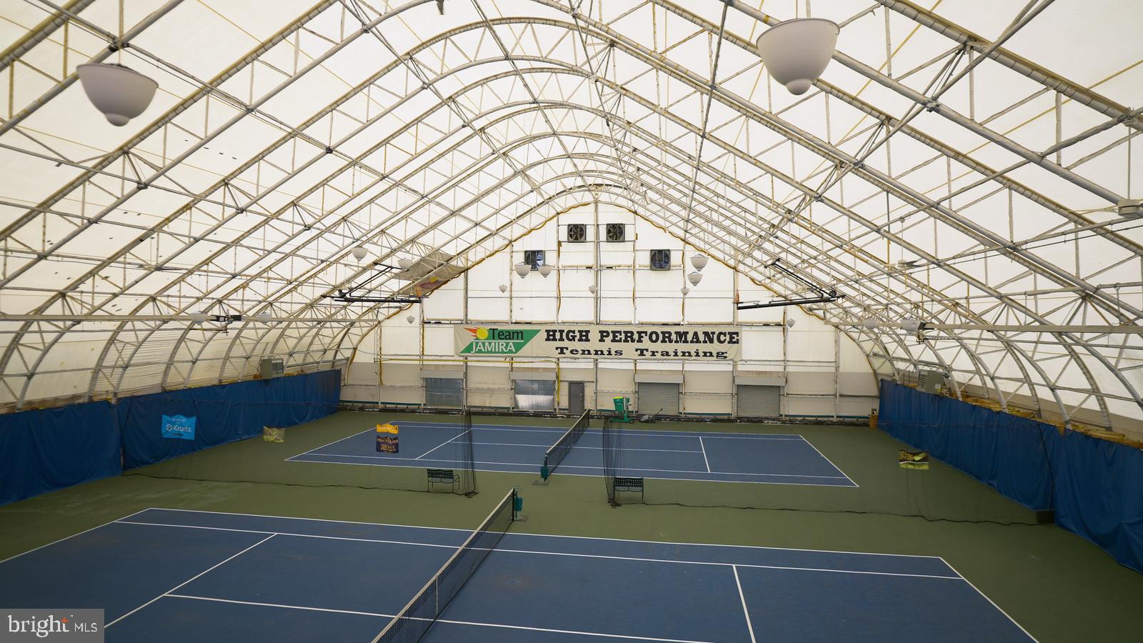Welcome to one of Philadelphia’s largest and most versatile athletic properties, Jamira Tennis & Fitness center, located in the heart of historic Germantown. This space has served as a cornerstone of community enrichment and athletic development for years. This iconic facility has long been dedicated to inspiring the youth-beginners & advanced players alike, to embrace the game of tennis ans further their mission of grassroots participation.
Spanning 40,920 square feet, this fully equipped tennis facility offering year-round indoor play and professional-grade amenities. Ideal for sports academies, wellness centers, or private training operations, the space is move-in ready and rich with potential.
Under its striking white dome structure, the Jamira Center offers year-round access to: