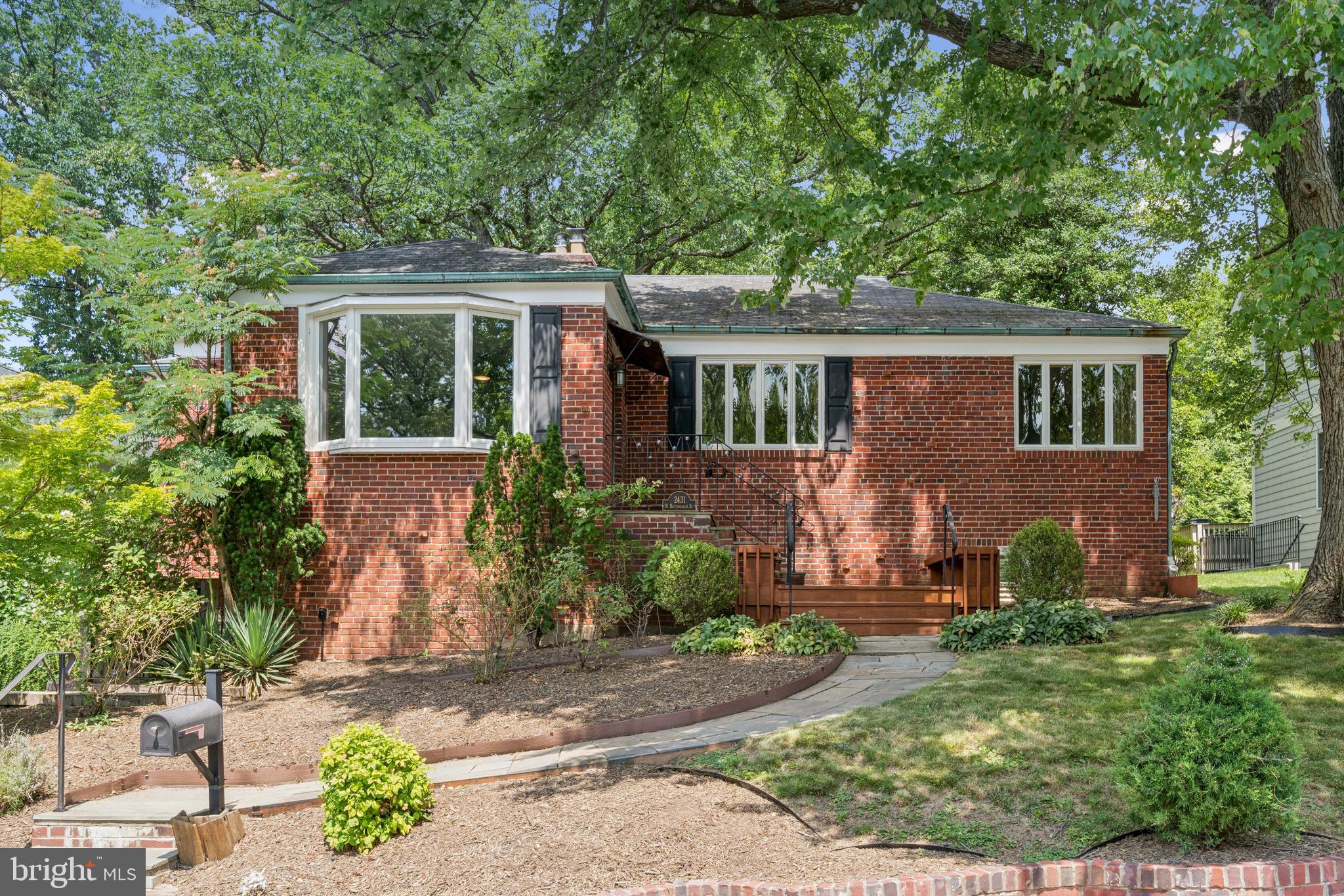 You'll want to stroll up to this charming home, the stone pathway with its carved beds with and beautiful plantings is so inviting. Stylish hip roof, copper gutters and large front porch area, you'll see right away this home is special. With 3 bedrooms and 2.5 baths on the main level, this renovated solid brick rambler is move-in ready and waiting for you. Step inside to ash hardwood floors and a fabulous bay window. The living room features a striking fireplace with brick surround and a wood stove insert. Easy flow to the dining room with a wet bar alcove, and into the kitchen -- stunning with granite counters and breakfast bar, stainless steel appliances, and all the cabinet space you covet. Walk out to the freshly stained deck, so convenient for grilling, and a spacious fenced back yard. Downstairs is finished, with a family room, workout room and office nook, plus tons of storage space that could potentially be finished into a 4th bedroom with its own door to the outside. Freshly painted throughout in neutral shades. Located less than a mile from EFC Metro, and walkable to dining and shopping on Langston Blvd, with District Taco, Starbucks, A Modo Mio Pizzeria, and just down the street at Lee-Harrison Shopping Center - the hub of North Arlington restaurants and activities. Quick access to major routes I66 and 495, too.
Systems ages:
HVAC 2015
AC (outside): 2016
Windows: 2017
Water Heater: 2014