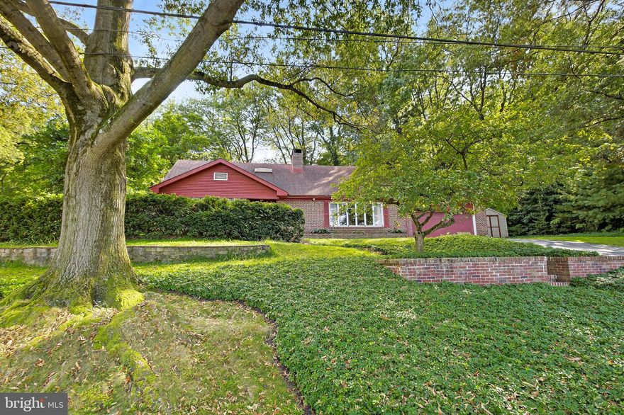 This gorgeous brick home sits on almost 0.5 acres and has nearly 3000 sq. ft. of finished space. The main floor includes one story living with 2 bedrooms (or use one for an office), a remodeled kitchen and bathroom, and fresh flooring and paint throughout. Upstairs you'll find more remodeled space and 3 more large bedrooms including one with a walkout balcony. The basement is fully finished with custom woodwork, a bar, half bath, and tons of space for entertaining or storage. Out back is a covered porch area, lots of green space and tons of privacy. The roof and mechanicals are newer too! This is an amazing home in fantastic shape. Reach out to us today!