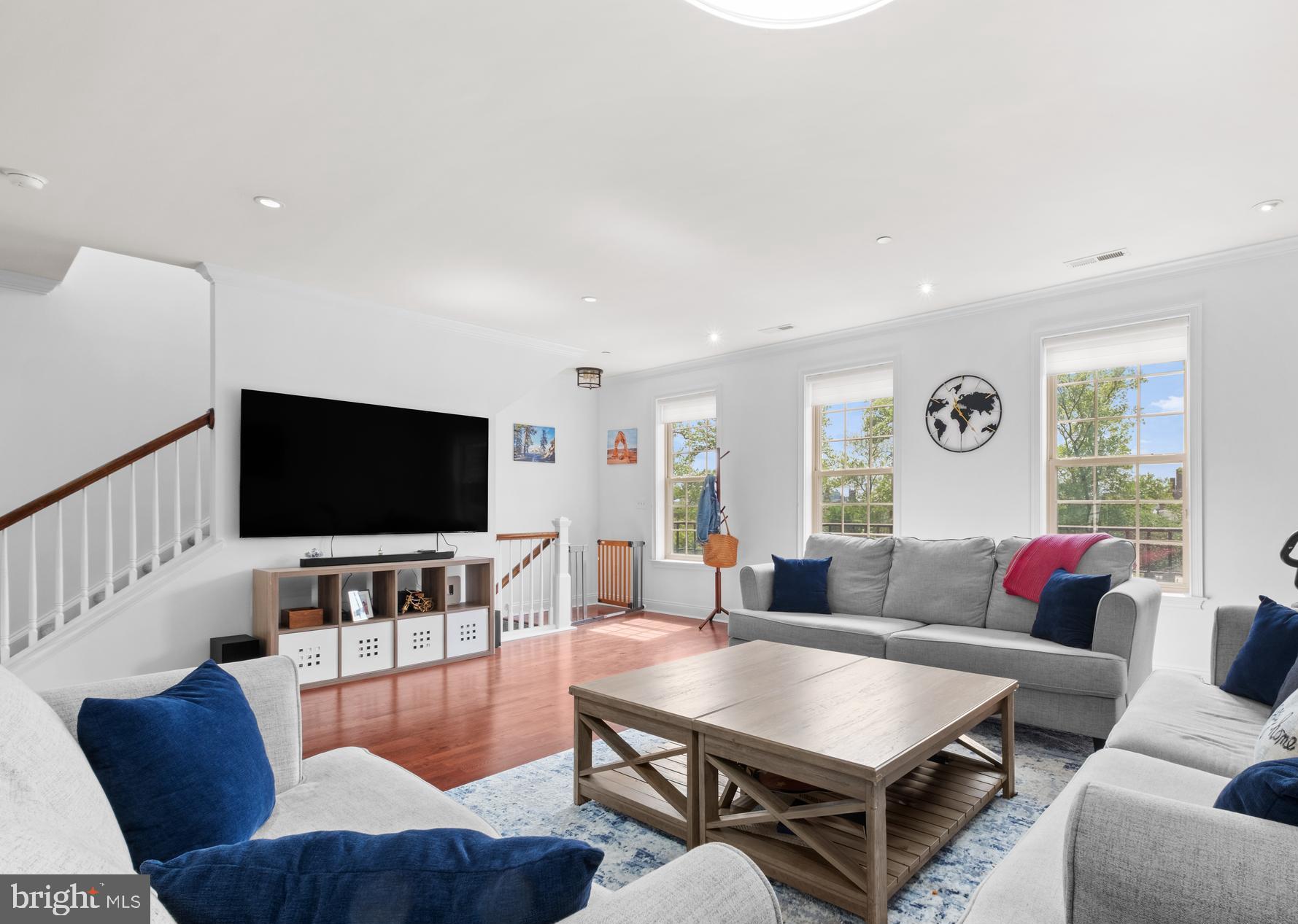 Showings start at the Open House Saturday 12-2pm. Presenting 303 Surgeon General’s Court, an exceptional, 23-foot wide bi-level townhome, ideally positioned in the front of the exclusive Naval Square community. Enjoy breathtaking views of the lush, tree-lined parade grounds from your doorstep, offering a rare combination of tranquility and city living in the heart of Philadelphia. This meticulously maintained home offers 3 spacious bedrooms, 2.5 bathrooms, a generous private terrace, and the convenience of a one-car garage—plus the option to purchase an additional parking space! First level: Step into a bright, open-concept living area, beautifully appointed with rich hardwood floors, Hunter Douglas blinds, fresh neutral paint, and plenty of upgraded lighting. The chef-inspired kitchen is a standout, featuring shaker-style cherry cabinetry, a tumbled marble tile backsplash, sleek granite countertops, full size pantry & under cabinet lighting. Enjoy a premium stainless appliance package, including an LG refrigerator & range (2022), Bosch dishwasher (2020) and GE Profile microwave. The adjacent dining space showcases a stunning wall of custom built-ins with wine fridge and opens onto a full-length private terrace—perfect for relaxing or entertaining. Second level: Retreat to the elegant primary suite with vaulted ceilings, with plush carpeting, an oversized walk-in closet with custom built-ins, and a luxurious en-suite bath with dual vanities, granite countertops, separate linen closet, and an expansive walk-in shower. Two additional sun-filled bedrooms—one also with a walk-in closet—share a well-appointed hall bath. A convenient laundry closet with newer LG washer/ dryer (2020) completes this level. Additional highlights include an attached garage with built-in storage shelves. There is also plenty of room to store bikes, strollers, etc in the hallway leading to the garage. Enjoy the ease of having the heater outdoor pool & state-of-the-art fitness center less than a minute walk from your building and the concierge close by. You’ll also love the convenience of having an Amazon Locker station right in the community. The dramatic community room in Biddle Hall rotunda is perfect to reserve for private parties. Enjoy the outdoor amenities of the 20-acre park-like setting: including picnic areas, well-kept gardens & mature landscaping. With a gated entry and on-site visitor parking, convenience and security are paramount. Very close proximity to South Street Bridge, UPenn (0.7 mi), CHOP, HUP & Drexel, Rittenhouse (0.9 mi) & Fitler Square. Fantastic restaurants and cafes, such as Rival Bros Coffee, Friday Saturday Sunday (James Beard Winner), Illata BYOB, Pub & Kitchen, Southgate, Sabrina's & Loco Pez, are all just steps outside the gates. The new Heirloom Market by Giant and South Square Market are only a block away. Directly out the back gate you will find easy access to the Schuylkill River Park, including the Award Winning Trail & Boardwalk, Markward playground, Tennis Courts & dog park! Naval Square is a pet friendly community allowing up to 2 pets with no weight restrictions. Don't miss this rare opportunity to own a piece of urban paradise in one of Philadelphia's most sought-after neighborhoods! Please note the seller is willing to sell the home with an additional parking space for $915,000. There is a separate annual tax bill for the parking space of $559/ year and a separate monthly condo fee of: $46.34.