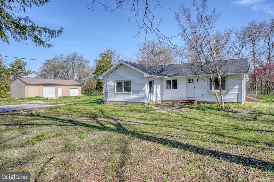 Welcome to this beautifully fully renovated single-family home offering the perfect blend of modern updates and peaceful country living. Situated on over 3 acres, this 3-bedroom, 2-bath residence features a spacious primary suite complete with a private en-suite bath and walk-out patio overlooking the backyard—ideal for relaxing or entertaining.

Inside, you’ll find luxury vinyl plank flooring throughout the main living areas and plush carpet in the bedrooms. The stunning kitchen boasts brand-new cabinetry, granite countertops, and stainless steel appliances, making it both stylish and functional. Every major system has been thoughtfully updated, including new HVAC system, new septic, new roof, new electrical panel, and new siding, providing peace of mind for years to come.

Outside, the property truly shines with a 48 x 24 pole barn featuring concrete flooring and electric—perfect for storage, a workshop, or hobbies. With ample space, modern finishes, and extensive upgrades, this move-in-ready home offers comfort, convenience, and room to grow.