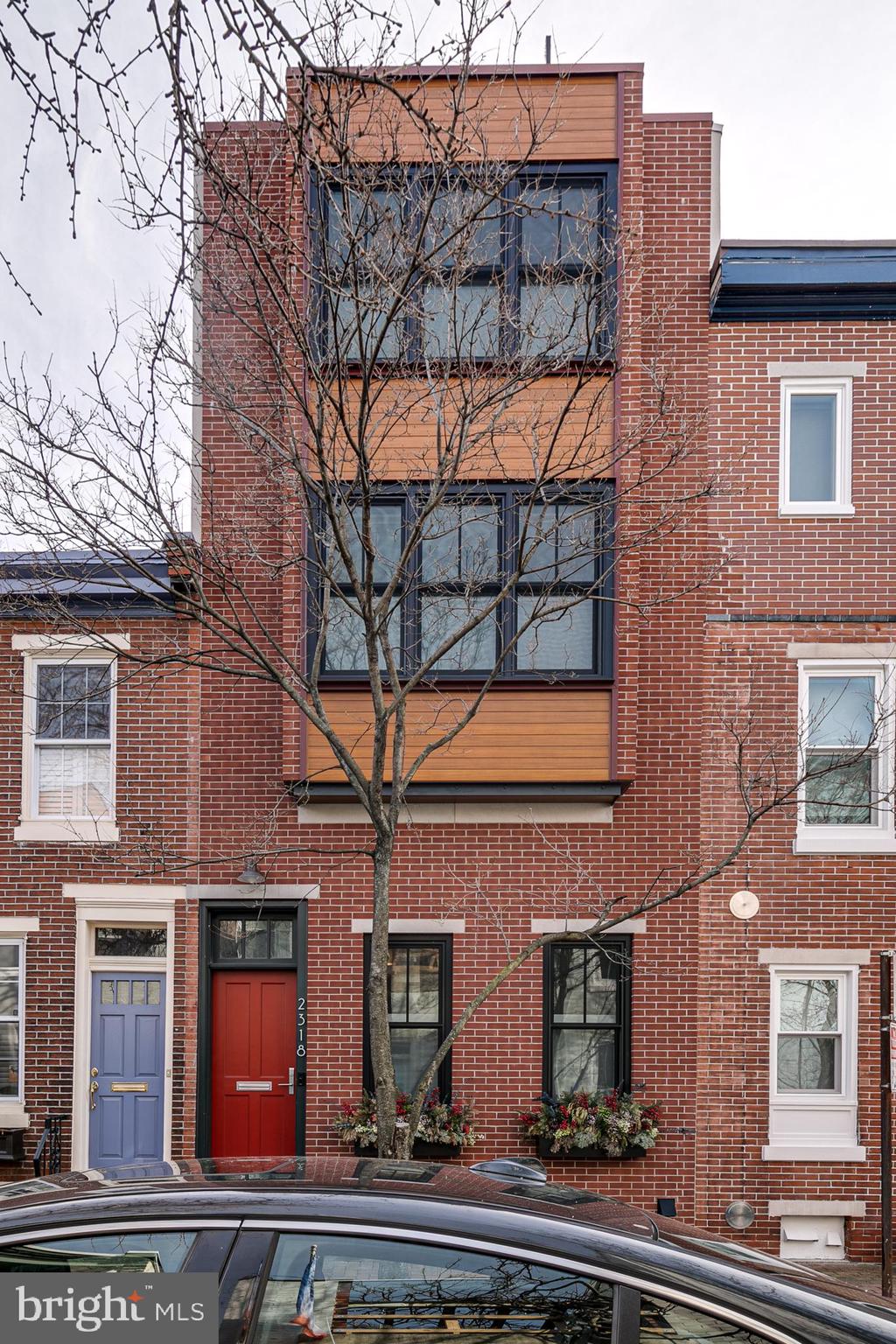 New Construction 3 bed 3 full and 2 half bath home, separate office, amazing roof deck and 7 years left on the TAX ABATEMENT! Fully custom built house with modern high-end finishes throughout located on one of Fitler’s Square best blocks! Enter to the foyer/ mudroom with built-in closet space, walk up to your open and bright chef’s kitchen with custom built soft close cabinetry, smartly designed pantry, stone countertops, Thermador Professional 48" Dual-Oven with indoor grill, SubZero Refrigerator, Thermador Dishwasher and Built-in Sharp Microwave, breakfast bar and dining area with large south facing windows that lead to the back private patio. Half bath off of the kitchen to complete this level. Lower level serves as the living area with bright light and additional space used as a home gym with half bath and side by side dual washer and dryer. Walk up the steel open riser staircase to the second floor, front bedroom which boasts built-in cabinetry, a fully tiled marble shower with a rain head and expansive windows that overlook the beautiful tree lined Waverly Street. Find custom cabinetry for additional storage in the hallway that leads to the second well sized bedroom with closet and fully tiled bath/shower combo. Up the stairs to the third level primary suite with spacious walk-in closet, and luxurious fully tiled bathroom with double shower, rain head and frameless glass door. The hallway is equipped with built-in cabinetry which creates a private home office. First deck with spiral staircase up to the expansive treks roof deck which comes furnished and provides outdoor kitchen, refrigerator and sink, perfect for entertaining with panoramic views of the city! Improvements include a Security system featuring hardwired windows and doors, Ring doorbell and 2 x Ring cameras on 1st floor and lower level. Full In Home Audio Visual Package with built-in speakers and Sonos system. Home had a variance grated to build deeper on the lot than other properties and is spacious throughout. Steps from Fitler Sq, Rittenhouse Sq, Schuylkill River Trail and to the best restaurants in the city such as Vernick, Ambrosia and Rival brothers. A short walk to PENN CHOP, 30th street station and all of Center City.