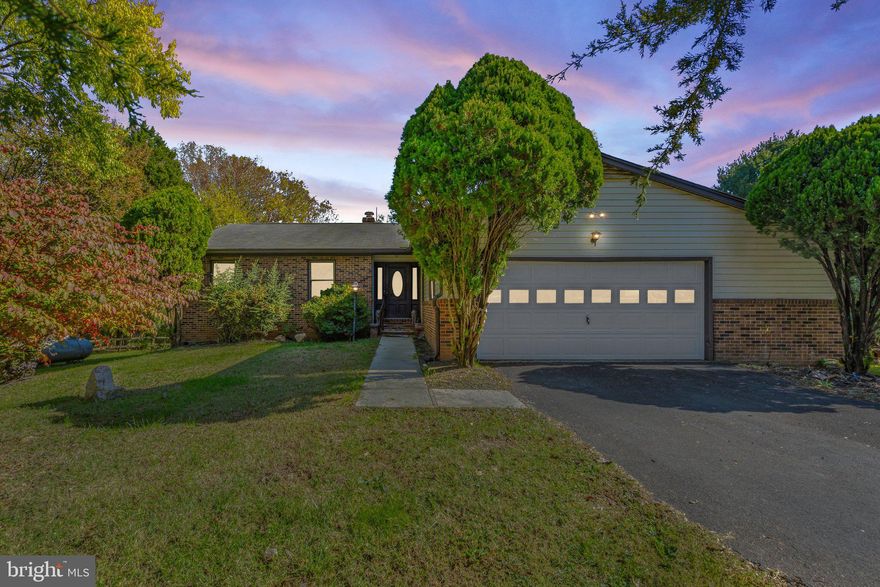 This warm and welcoming,  spacious rambler offers two finished levels.  The main floor boasts beautiful hardwood floors along with a brick fireplace in the living room with mantle and raised hearth.  4 bedrooms on main level with 2.5 baths.  Lower level features an expansive family room with woodstove.  Lots of additional rooms with full bath on  lower level.  Two car garage has bonus storage area along with paved driveway providing  ample parking.  Convenient location to Warrenton and beyond with great accessibility  to Route 29.  New Carrier Furnace 2021.   Huge kitchen with cooktop in center island. Abundant cabinetry and counter space.  Utility room with washer, dryer and tub sink.  Wrap decking from side to rear with access from kitchen and dining area.  Patio area off walkout basement.  Surrounded with lovely yard areas with mature trees and landscaping.