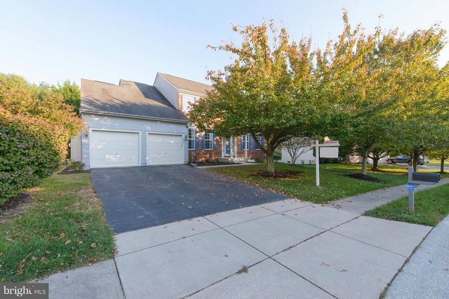Every inch of this beautifully finished brick front colonial shows impeccably well. Seller spared no expense and included new hardwood floors in several rooms, new appliances and granite in the kitchen. Lower level includes a bonus room, kitchenette and full bath and access to outside. Yard includes INVISIBLE fence for pet, shed for storage and hot-tub for relaxation.
