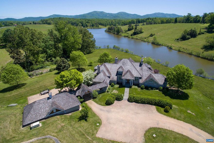 Hard to believe a property with 360 degree views, 15+ acre lake, lush rolling fields of rich grass and a spectacular 5-bedroom home with tall ceilings, heart pine floors, four fireplaces, a study, garages and unparalleled views exists. Located in Greenwood, this exceptional 317-acre property is a gem; a one-of-a-kind, not to be replicated, gem. Add to all mentioned above a handsome log cabin with fireplace, stunning party barn and a two bedroom cottage. Additional acreage available.,Painted Cabinets,Wood Counter,Fireplace in Living Room,Fireplace in Master Bedroom
