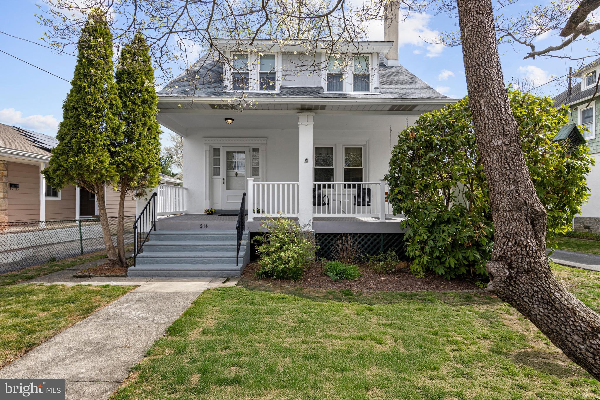 Built in the 1920's this wonderful home has been lovingly cared for and maintained by the same owners for nearly 45 years. Loaded with charm and special features throughout including a fabulous covered front porch, a perfect place to sit and relax. There is a lovely foyer entry with coat closet and a living room to the right with a gas fireplace and built-in bookshelves. The living room opens into a gorgeous light filled dining room with wainscotting. The eat-in kitchen has been recently updated and features tons of storage and cabinetry including a pantry and stackable washer and dryer, granite counter tops and radiant heated floors. The kitchen has sliders that lead to a back deck that overlooks a large flat fenced in backyard. There is a large powder room as well. There are four generous size bedrooms on the second floor and an updated hall bath. The third floor includes a bonus room perfect for an office, den, playroom, craft room, etc. and floored storage area. In addition this home has an amazing location with sidewalks and a park across the street and is within the awarding winning Wallingford-Swarthmore School District.