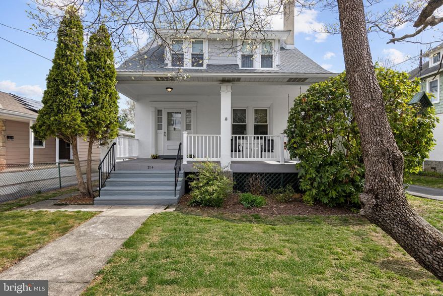 Built in the 1920's this  wonderful home has been lovingly cared for and maintained  by the same owners for nearly 45 years. Loaded with charm and special features throughout  including a fabulous covered front porch, a perfect place to sit and relax.  There is a lovely foyer entry with coat closet and a living room to the right with a gas fireplace and built-in bookshelves.   The living room opens into a gorgeous light filled dining room with wainscotting. The eat-in  kitchen has been recently updated and features tons of storage and cabinetry including a pantry and stackable washer and dryer, granite counter tops and  radiant heated floors.   The kitchen has sliders that lead to a back deck that overlooks a large flat fenced in backyard. There is a large powder room as well. There are four generous size bedrooms on the second floor and an updated hall bath. The third floor includes a bonus room perfect for an office, den, playroom, craft room, etc. and floored storage area. In addition this home has an amazing location with sidewalks and a park across the street and is within the awarding winning Wallingford-Swarthmore School District.