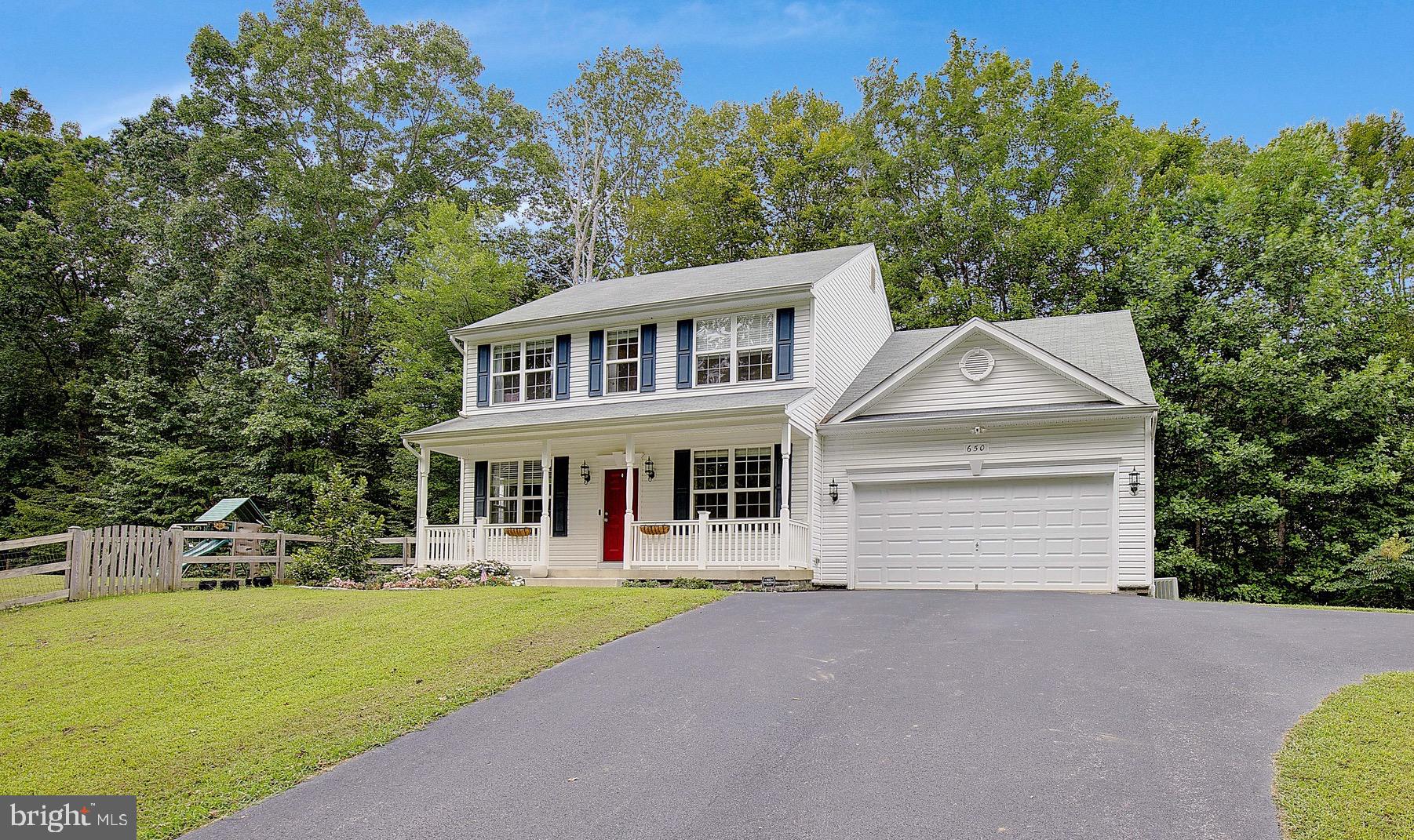 Great price on this spacious Colonial in sought-after College Station! Featuring 4 bedrooms, 2.5 baths, and a prime central location in the heart of Prince Frederick—just minutes to shopping, restaurants, movie theater, and the hospital. Is a convenient commute with only 45 minutes to PAX River & Joint Base Andrews, and about an hour to Washington, D.C. The primary ensuite offers a walk-in closet, ceramic-tiled soaking tub, separate shower, and dual vanities. The main floor boasts an open layout with a living room featuring a cozy gas fireplace, a dining area off the kitchen, a half bath, and a versatile office/playroom with French doors. The kitchen boasts 42" cabinets, upgraded white quartz countertops, stainless steel appliances, a built-in microwave, pantry, convenient nearby laundry closet and access to the 2-car garage. The fully finished basement includes a large recreation room and abundant storage space. Outside, enjoy a fenced 1-acre +/- lot with a playset that conveys, plus a beautiful hardscape with fire pit. Relax on a quiet street with protected woodlands across the street and behind the property.