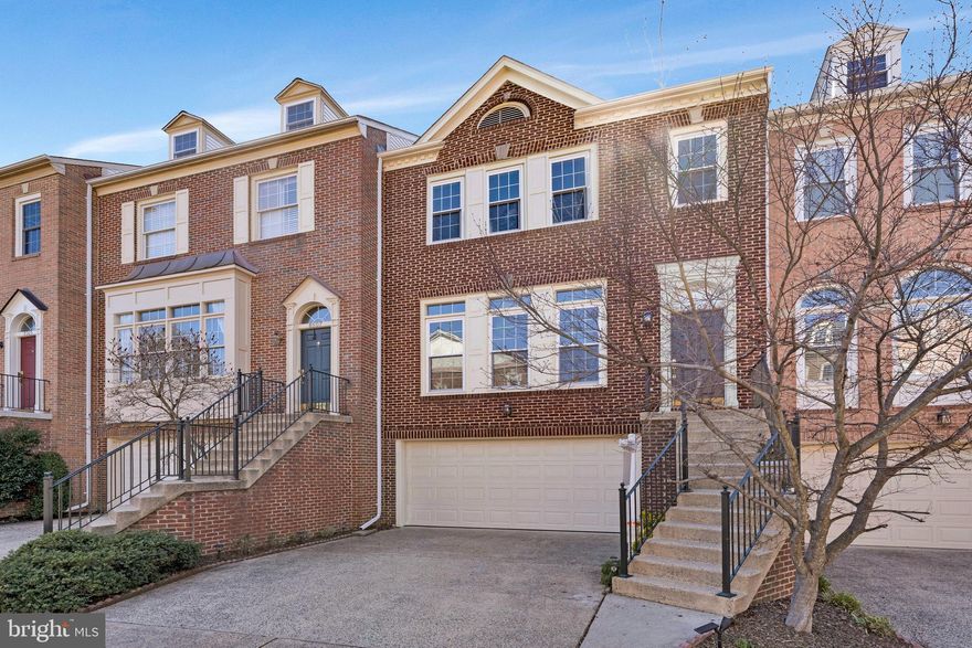 **Contracts due Tuesday, April 1, by 10 AM. **This exceptional townhome is truly one of a kind, featuring over $250K in upgrades and soaring 9-foot ceilings. The elegant dining room steps down into a spacious living room, creating an inviting and open flow. Enjoy new maintenance free double windows on top 2 floors (2018) and two sets of French doors that open from the kitchen and family room to a custom maintenance free Timbertek deck, perfect for outdoor entertaining. The exquisite expanded kitchen is a chef’s dream, boasting 48-inch ceiling-height cabinetry, a large square island with seating, stainless steel appliances, a gas cooktop with a designer vent hood, a drawer microwave in the island, a double oven, and stunning glass pendant lighting. A renovated half bath is located on the main level. Montreal hardwood floors add warmth and sophistication throughout the main and upper levels. Upstairs, the second level features two beautifully customized bathrooms, including a luxurious primary suite with vaulted ceilings and custom closet built-ins. The spa-like primary bath offers a freestanding tub, high-end hardware, an oversized shower, tall vanities, and bright, elegant tilework. The lower level is equally impressive, featuring a spacious recreation room with a cozy gas fireplace, brand-new carpet (installed in 2024) and freshly painted, and a fully remodeled full bath. French doors lead out to a patio with custom pavers, providing plenty of space for outdoor furniture and a grassy area. **ROOF REPLACED 2021, GAS WATER HEATER REPLACED 2024** Don’t miss this extraordinary home! *CONTRACT CONTINGENT FOR 72 HOURS for seller's HOC.