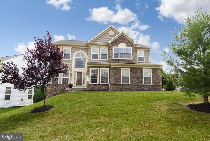 Stone front 2-car garage colonial in sought after Autumn View! Eat-in kitchen w/double wall oven, gas cooktop, tile backsplash & granite island; FR w/stone gas fireplace; master suite w/sitting room, cathedral ceilings & walk-in closet; fully finished walk-out LL w/3rd full bath & storage rm; community pool/tennis/gym/playground!