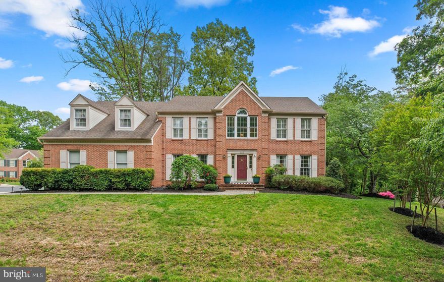Welcome home to this brick front colonial in the highly sought after community of Shipley's Choice.  Perfectly located on a quiet cul de sac close to the elementary school, pool, tennis and playground!  Offering 5 bedrooms, 4 full bathrooms a 2 car side entry garage and a full basement, there is no shortage of space in this Winchester Homes Exeter model.  Thoughtfully updated and meticulously maintained, you will immediately appreciate the fresh, designer neutral paint throughout along with the gleaming hardwood floors throughout the main level plus custom plantation shutters on the upper level.  Newly replaced carpeting on upper and lower levels. Enter into the 2 story foyer overlooking the bedroom level above, with classic wainscotting.  Private office or study with built in shelving and workspace is to one side and the formal living room to the other that flows perfectly into the large dining room beyond.  The kitchen is updated with stainless appliances & granite counters including a center island perfect for entertaining. There is additional room for a casual dining table flowing directly into the great room with soaring ceilings and access to the rear patio.  Travel to the bedroom level with 4 spacious bedrooms and 2 full bathrooms, both beautifully renovated.  The basement offers more living space with a finished rec room complete with more built in storage, a home gym/workout area plus the 5th bedroom with its own private bathroom perfect as an in-law or au pair suite!  Bonus storage room with laundry and crawl space completes this level.  Beautifully manicured landscaping and private rear yard with paver patio.  Appliances updated in the last 5 years (HVAC, water heater, laundry, kitchen) Easy commuter access & Severna Park Blue Ribbon Schools...This home is a MUST SEE!