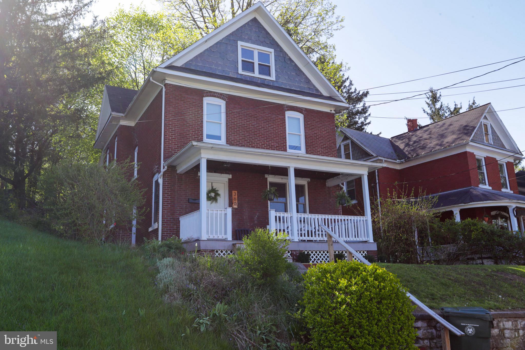 Welcome to 360 Pine St, a charming 3-bedroom, 2.5 bathroom, brick home conveniently located in the heart of downtown Bellefonte. This home is the perfect blend of classic and modern charm, boasting a freshly renovated interior spaces,  updated bathrooms and kitchen as well as attractive outdoor amenities. The owners suite features a newly renovated full bathroom,  a large closet and even a sunroom! The large front porch overlooks the mountains and an entertaining space off the back deck featuring built in fire pit. Offering three floors of finished living space, you’ll find everything you need, including storage, home office, plus more!  Uniquely equipped with 2 off-street parking spots, and additional on-street parking, you will never have to worry about finding a spot for your vehicle. Don’t miss the opportunity to make this wonderful home yours!
