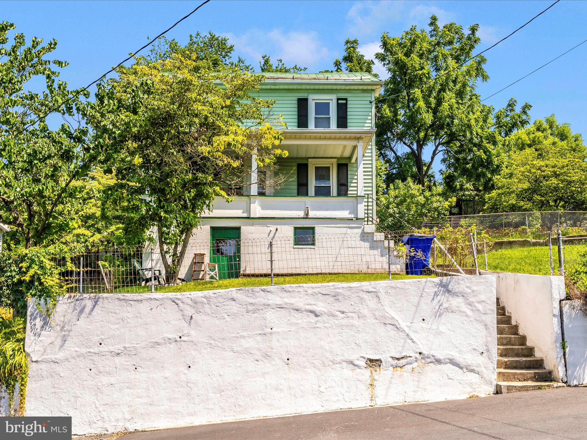 This lovingly cared-for 2-bedroom, 1-bath home offers timeless appeal and the perfect balance of character and comfort. From the moment you arrive, you'll be greeted by a welcoming front porch—ideal for enjoying your morning coffee or relaxing in the evenings. Inside, the home showcases a bright and functional layout with fresh, neutral tones, making it easy to envision your own style throughout. The spacious living room features abundant natural light and flows effortlessly into the dining area, offering an inviting space for everyday living and entertaining. The kitchen, meticulously maintained over the years, features quality cabinetry, ample counter space, and room for updates if desired—truly a blank canvas for your dream kitchen. Both bedrooms are generously sized with closets, and the full bathroom is clean, classic, and in excellent condition. A dedicated mudroom offers convenient access to the backyard, where you’ll find a private outdoor space perfect for gardening, barbecues, or simply unwinding after a long day. Situated in a quiet, established neighborhood close to parks, schools, shops, and commuter routes, this home is truly a rare find. Whether you're a first-time buyer, downsizer, or investor, this gem is ready for its next chapter.