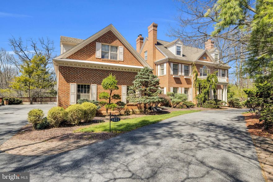 Offered for the first time in years, this extraordinary brick estate—custom built by Frank Ferrara—presents a rare opportunity to own a true architectural gem in one of Wyomissing’s most coveted settings. Spanning over 8,000 square feet, the home offers a storybook presence with breathtaking views of the Wyomissing Park System.

Rich in timeless craftsmanship and elegant design, this home showcases magnificent custom woodwork, hardwood flooring, imported tile and marble, graceful arched passageways, and a dramatic three-story staircase that serves as the home’s stunning focal point.

Designed for both grand entertaining and refined everyday living, the home features 7 bedrooms, 4 stately fireplaces, and an impressive great room–style kitchen. The kitchen is the heart of the home, highlighted by a vaulted, light-filled breakfast area, a large center island, and a secondary staircase. The adjoining great room boasts coffered ceilings and three sets of French doors with transom windows, opening to the expansive rear deck.

A private main-floor office/study with custom built-ins and double French doors offers the perfect work-from-home retreat.

The luxurious primary suite features dual walk-in closets and a spa-like bath complete with a double vanity, jetted tub, and stall shower. Additional bedrooms are generously sized, including a Jack-and-Jill suite with walk-in closets, a private en-suite bedroom, and a fourth bedroom on the second level. The third floor offers two additional spacious bedrooms and a full bath—ideal for guests or extended living.

The lower level is designed for recreation and relaxation, featuring an expansive game and entertainment area with a sauna and French doors leading to the rear grounds.

Outdoors, the deck provides a stunning setting for entertaining while overlooking Wyomissing Creek and the surrounding natural beauty. A private driveway leads to a 3-car garage, offering ample parking and convenience.

Impeccably maintained, this remarkable residence blends luxury, character, and an unparalleled setting—truly a rare offering.