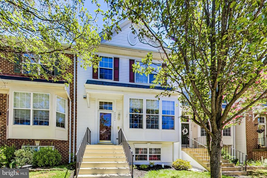 Welcome to this lovely home, meticulously maintained, situated perfectly in a cul-de-sac.  4 bedrooms, 3.5 bathrooms, 3-finished levels, walkout basement. Recent updates including energy efficient AC, Heating system and Roof. Inviting and efficient floor plan. Cherry hardwood floors on main level. Step down from the living room to the dinning/kitchen area. Kitchen has granite counters and island that opens to a large deck perfect for entertaining, overlooking community green space. Upper level has 3 bedrooms that includes a spacious master bedroom with vaulted ceiling, walking closet. Master bathroom has separate soaking tub and shower, dual vanities and skylights. Lower level with fourth bedroom, full bath, fireplace in rec room, and storage space, walk out to a private patio. Dimmable recessed lighting throughout. Community pool and play areas. Conveniently located close to shopping, restaurants, major commuter routes.