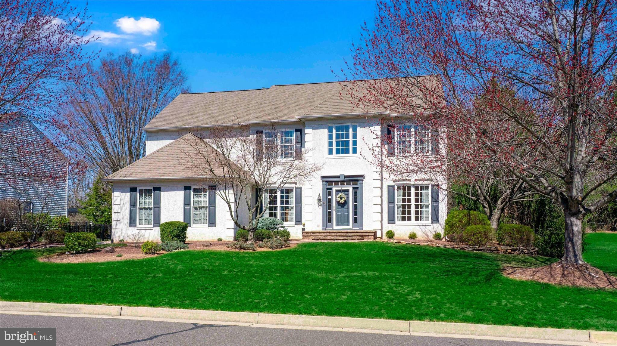 Welcome to this STUNNING four-bedroom, three-and-a-half bath home located in sought-after Eagleton Farms. Located on arguably the best lot in the development, this Premium lot backs to permanent open space and a tree farm. It features a lavish custom pool and expansive paver patios and walkways. This sunny house features hardwood floors throughout, including on the stairs, and great windows in all directions. The two-story foyer is flanked by the formal living room and dining room, situated on opposite sides, and features extensive custom molding throughout. The high-end kitchen features upgraded white cabinetry, new stainless steel appliances, granite countertops and island, and a subway tile backsplash. The dramatic two-story family room features a wood fireplace flanked by tall windows and more custom molding. There are lots of recessed lights throughout, along with tasteful light fixtures. Between the family room and the first-floor office is a charming decorative alcove. The office has a custom built-in mahogany desk with magnificent bookcases. All baths are new!
The main bedroom suite has an extra deep tray ceiling, a spacious walk-in closet, and a new, very lavish bath featuring a generously sized ceramic tile shower and free-standing tub. The main bedroom suite also has wonderful windows overlooking the backyard. All secondary bedrooms are spacious and share another new bath. The home features faux wood blinds throughout.
The fabulous, professionally finished basement features a built-in bar, an entertainment area, and a new bathroom. The facade of the home features premium stucco and professional landscaping throughout. Located in the highly acclaimed Council Rock School District, minutes to I-95, Route 1, the Turnpike, and train stations to both New York and Philadelphia.
This home is ready to be your dream home!