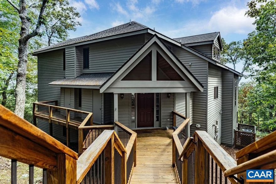 This beautiful view house is being offered for the first time for sale. It is one of the few large homes which has recently become available in the Blackrock Subdivision on Greenstone Drive in years. The furnished spacious three-level floor plan is ideal for large families with six bedrooms, multiple living areas and with each level offering stunning year-round views of Rockfish Valley and the Piedmont Plateau beyond. Three generations of a family have used it as a second home and never rented it. It would also be an ideal home for two or three families who are looking to buy a vacation home in a year-round community such as Wintergreen.,Cutting Board,Glass Front Cabinets,Granite Counter,Wood Cabinets,Fireplace in Family Room,Fireplace in Living Room