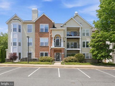Photo of 4135 Fountainside Lane #101, FAIRFAX, VA 22030 (MLS # VAFX2310212)