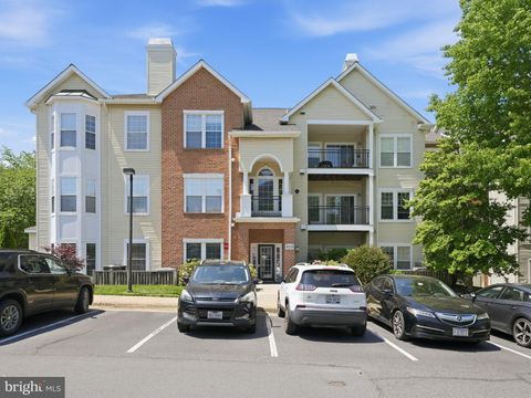Photo of 4135 Fountainside Lane #101, FAIRFAX, VA 22030 (MLS # VAFX2310212)