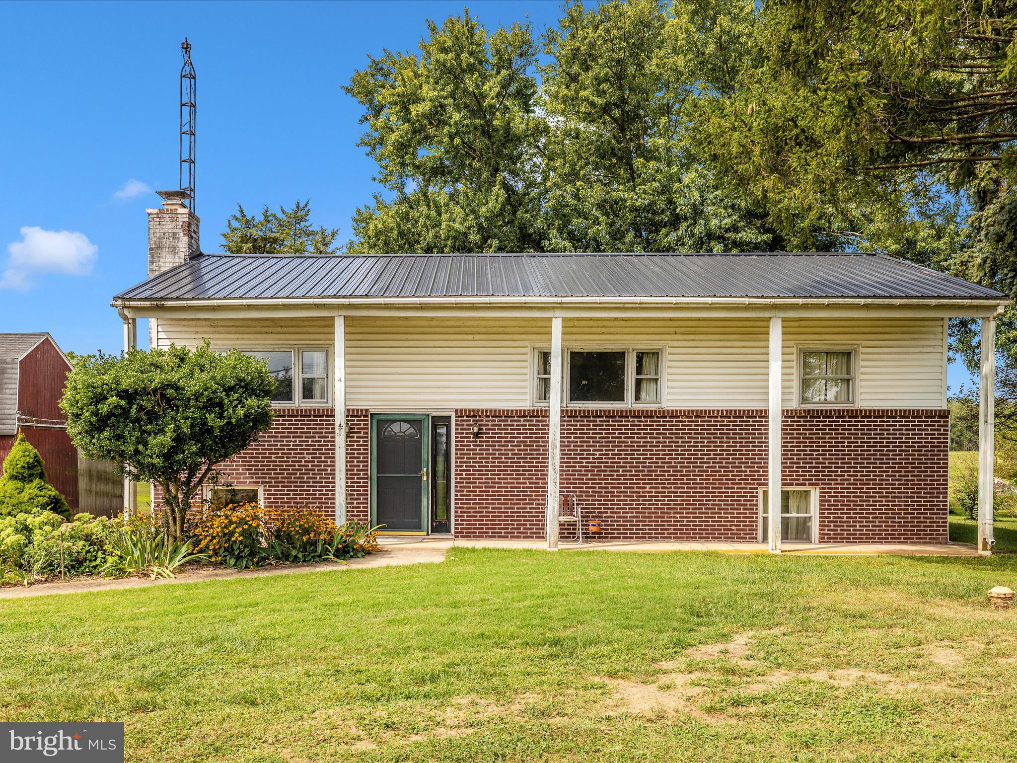 Welcome to 12622 Creagerstown Rd, a charming split-foyer home nestled on 1.54 picturesque acres in the heart of Frederick County. This 3-bedroom, 1-bath home offers a versatile layout with plenty of space to relax, work, and entertain. The main level features a spacious kitchen with a dining area, a cozy sitting room with large window which could also serve as a formal dining space, depending on your needs. You'll also find a living room with a large window, along with the primary bedroom, a second bedroom, a den or nursery and a full bath. The lower level offers a comfortable family room with a woodstove, a third bedroom, an office, and a utility/laundry room with additional storage space. Outside, enjoy views of surrounding farmland, a storage shed, and plenty of space to garden, play, or simply unwind. Roof replaced in 2024, water heater in 2019. Just minutes to Thurmont or Frederick, and convenient to parks, schools, and shopping. This is a must see.