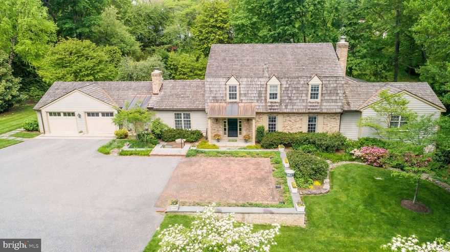 IF A CONVENIENT LOCATION AND A ONE OF A KIND VIEW ARE SOMETHING YOU WISH FOR, THEN THIS HOME IS FOR YOU. UNPARALLELED COMBINATION OF CONVENIENCE AND PRIVACY ARE OFFERED IN THIS MASTERFULLY  REMODELED 5 BEDEROOM 4 1/2 BATH COLONIAL ON .78 ACRES IN SOUGHT-AFTER RUXTON. SO CLOSE TO ALL THE CITY HAS TO OFFER, YET FEEL LIKE YOU LIVE IN THE COUNTRY. ENJOY NATURE FROM YOUR STONE PATIO WITH FOUNTAIN AND PERGOLA OFF FAMILY ROOM OR FROM DECK OR SCREENED PORCH OFF THE FIRST FLOOR PRIMARY BEDROOM SUITE ALL OVERLOOKING YOUR STONE WALLED BACKYARD WITH STONE STEPS TO A STREAM AND TREES. 3 FIREPLACES, GLEAMING WOOD FLOORS, TASTEFUL BUILT-INS, ATTENTION TO DETAIL IN THIS QUALITY REMODEL. WELL PLANNED ADDITIONS OFFER SPACES FOR QUALITY FAMILY TIME OR ALONE TIME OR GRACIOUS ENTERTAINING. ADDITIONS WERE DESIGNED BY PETER RADCLIFFE, INTERIOR DESIGN BY ALEXANDER BAER (JENKINS BAER), LANDSCAPING BY MAXALEA. PUBLIC WATER AND SEWER. GENERATOR SERVICES REFRIGERATOR, GARAGE DOORS, SECURITY SYSTEM, HEAT, SUMP PUMP, LIGHTS IN PRIMARY BEDROOM, UPSTAIRS HALL LIGHTS AND MANY OF THE  LIGHTS AND OUTLETS IN THE KITCHEN, AND THE HOT WATER HEATER. ALL NEW LIGHTING AND REPLACEMENT WINDOWS (EXCEPT BREAKFAST ROOM). GRACIOUS LIVING ROOM & FORMAL DINING ROOM BOTH OFFER WOOD FLOORS AND GAS FIREPLACES WITH MANTLES. GOURMET KITCHEN WITH GRANITE COUNTERS INCLUDES VIKING  6-BURNER GAS RANGE AND STAINLESS STEEL APPLIANCES. 20 X 16 BREAKFGAST ROOM WITH FRENCH DOORS TO PATIO. FAMILY ROOM WITH WALL OF BUILT-INS IS OPEN TO HALLWAY ADDITION (WITH BAR AND REFRIGERATOR) THAT LEADS TO  FIRST FLOOR PRIMARY BEDROOM ADDITION WITH GAS FIREPLACE, TWO WALK-IN CLOSETS, BUILT-IN SAFE, LAUNDRY AREA WITH WASHER & DRYER (2020), AND OFFICE WITH CUSTOM CABINETRY, LUXURIOUS FULL MARBLE BATH. SCREENED PORCH (OFF PRIMARY BEDROOM) OVERLOOKS STREAM & WOODS. SECOND FLOOR HAS 4 BEDROOMS AND 2 REMODELED FULL BATHS. LOWER LEVEL WITH WALK-OUT INCLUDES RECREATION ROOM, FITNESS CENTER, WINE CLOSET, LOTS OF STORAGE, AND REMODELED FULL BATH WITH SHOWER. ATTACHED OVERSIZED 2-CAR GARAGE (DOORS REPLACED IN 2016).