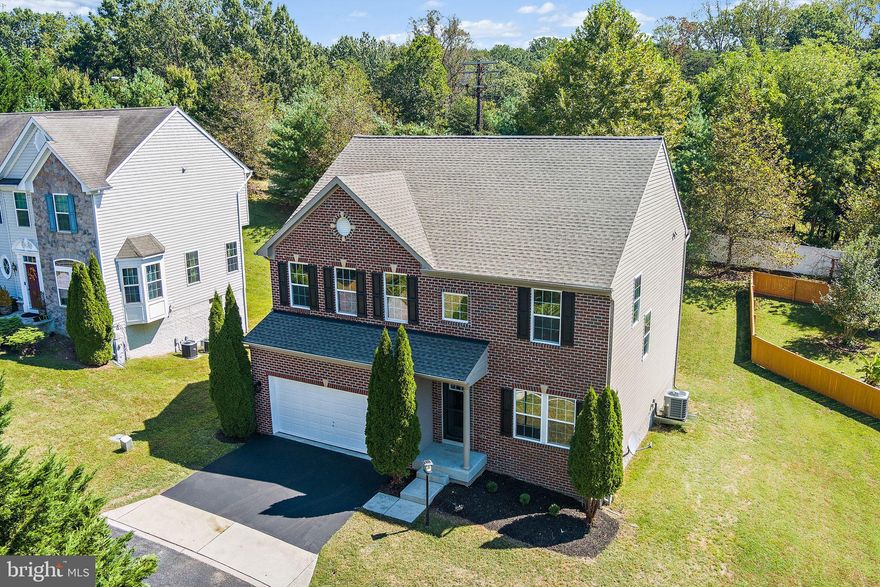 Welcome to 7004 Rhythm Rock – The Jewel of River’s Edge. This is the one you’ve been waiting for. Perfectly positioned in Columbia’s prestigious River’s Edge community, this residence exudes sophistication and modern elegance. Built in 2012 and meticulously upgraded with over $200,000 in designer enhancements, every detail of this home is crafted to impress. Step inside and prepare to fall in love. The main level is a showcase of style and function, featuring a refined living room, an inviting dining area, and a spacious family room perfect for entertaining. The gourmet kitchen is a chef’s dream—complete with professional-grade stainless steel appliances, striking two-tone cabinetry, upgraded quartz countertops, and a statement designer backsplash. From here, enjoy seamless access to the two-car garage, finished with sleek epoxy flooring and a fresh, polished look. Upstairs, four expansive bedrooms await, including a primary suite that redefines luxury. Indulge in a private retreat with abundant closet space and a spa-inspired en-suite bathroom adorned with custom tilework and modern finishes. Every full bathroom throughout the home has been masterfully designed for elegance and comfort. The lower level offers a versatile, fully finished basement with an egress window—ideal for a media room, gym, or additional living space. Outdoors, enjoy a private, spacious backyard, perfect for serene relaxation or lively gatherings with family and friends. Centrally located near renowned schools, parks, shopping, and dining, this home delivers the perfect balance of convenience and tranquility. 7004 Rhythm Rock is more than move-in ready—it’s a statement of luxury living in Columbia. Don’t miss your opportunity to make it yours.