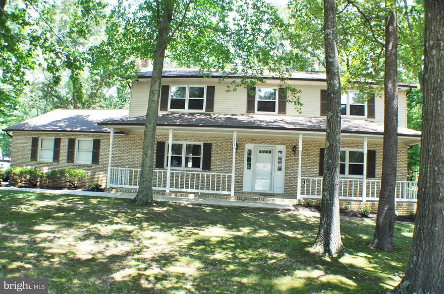 Large 2 story on almost half an acre, has covered front porch,  2 car garage. 4 good sized bedrooms on upper level & den or 5th br on main level plus an office, family room w/custom brick fireplace, dining room has chair & crown molding & big bay window. Back yard is fenced w/big deck on rear for entertaining! Some new appliances, new paint, carpet, kitchen & powder room floor! Priced to sell!