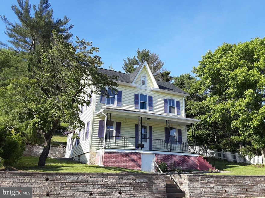 Back on the market! Buyer financing fell through! Recently updated 4 Bed, 2 Bath Colonial with historic 1870 charm is just waiting for your finishing touches! Sits on .54 acres with plenty of room to add gardens, terracing, or decking. Original refinished hardwoods and built-ins too. Spacious bedrooms and pantry. Bonus sunroom would make a great office or art studio. Main floor Family Room has closet and has been used as 4th bedroom. Living room, downstairs bedroom/family room, stairway, and kitchen have just been freshly painted with neutral colors. New heat pump in 2019 with 10-year warranty. New roof shingles in 2019.  Within walking/biking distance of C&O Canal and historic Main Street . Convenient to I-70. Minutes to Historic Berkeley Springs. Just 30 minute drive to Hagerstown.