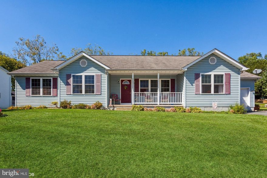The words “unique” and “utility” best describe this spacious 5-bedroom house located in New Windsor that is ideal for multiple occupancy, and in-laws living with loved ones. A rancher with glowing curbside appeal, the home’s front yard displays an attractive bird bath surrounded by a bounty of beautiful flowers. A one-car garage with shelving units provide parking for a large vehicle, and the paved driveway provides an additional 4 parking spaces. A gate on the right-hand side of the house gives entry to an expansive fenced back yard that includes a stone fire pit, and a large shed for tools and lawn mowing equipment. Dense foliage behind the back yard fence awards privacy for the homeowners, and a stairway with railing on the left-hand side of the house allows you to enter or exit the home from the basement. Two kitchens with electric stoves and refrigerators provide multiple meal opportunities, and the one kitchen with attached coffee bar provides a sliding glass door for back yard entry. Large living rooms, walk-in closets, two separate washer/dryer hookups, bedrooms with accommodating full baths, and the availability for large  storage in the unfinished basement area make this house ideal for those who want large living quarters, or two suites under one roof!