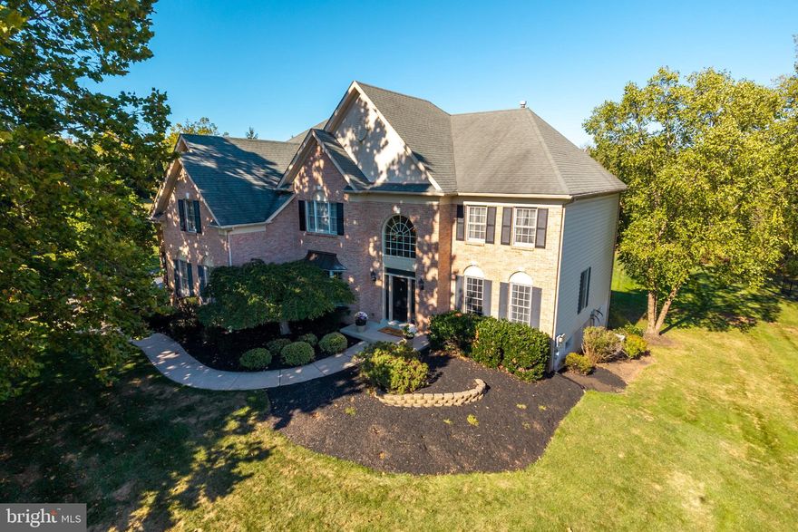 Welcome to the Estates at Faraway Farms in the highly regarded Spring-Ford School District, where this spacious Colonial home offers the perfect blend of comfort, style, and community. With more than 5,000 square feet of finished living space, this 4-bedroom, 4.5-bathroom home is designed with an open floor plan that’s ideal for both everyday living and entertaining. The heart of the home is the gourmet kitchen, featuring a central island and pantry, which flows seamlessly into the two-story family room. This open layout makes it easy to host gatherings while still being connected to the action. Each bedroom includes its own walk-in closet, offering generous storage and personal space. The primary bedroom walk-in closet might be the biggest you've ever seen! A fully finished walkout basement expands the living space even further, providing room for a media area, game room, gym, or additional entertaining space. Step outside to your private backyard retreat, complete with an outdoor kitchen, expansive deck, and beautifully landscaped patios. Whether you’re enjoying summer barbecues, quiet evenings outdoors, or hosting friends, this home is built for indoor-outdoor living. The property is located in a desirable enclosed neighborhood that offers both privacy and a welcoming community atmosphere. Convenience is unmatched—just minutes from Route 422, the PA Turnpike, and I-76, making commuting to Philadelphia or escaping to the Poconos a breeze. Additional highlights include a side-entry garage, ample driveway parking, and meticulous landscaping that adds to the curb appeal. This home truly combines thoughtful design, generous space, and a location that checks every box.