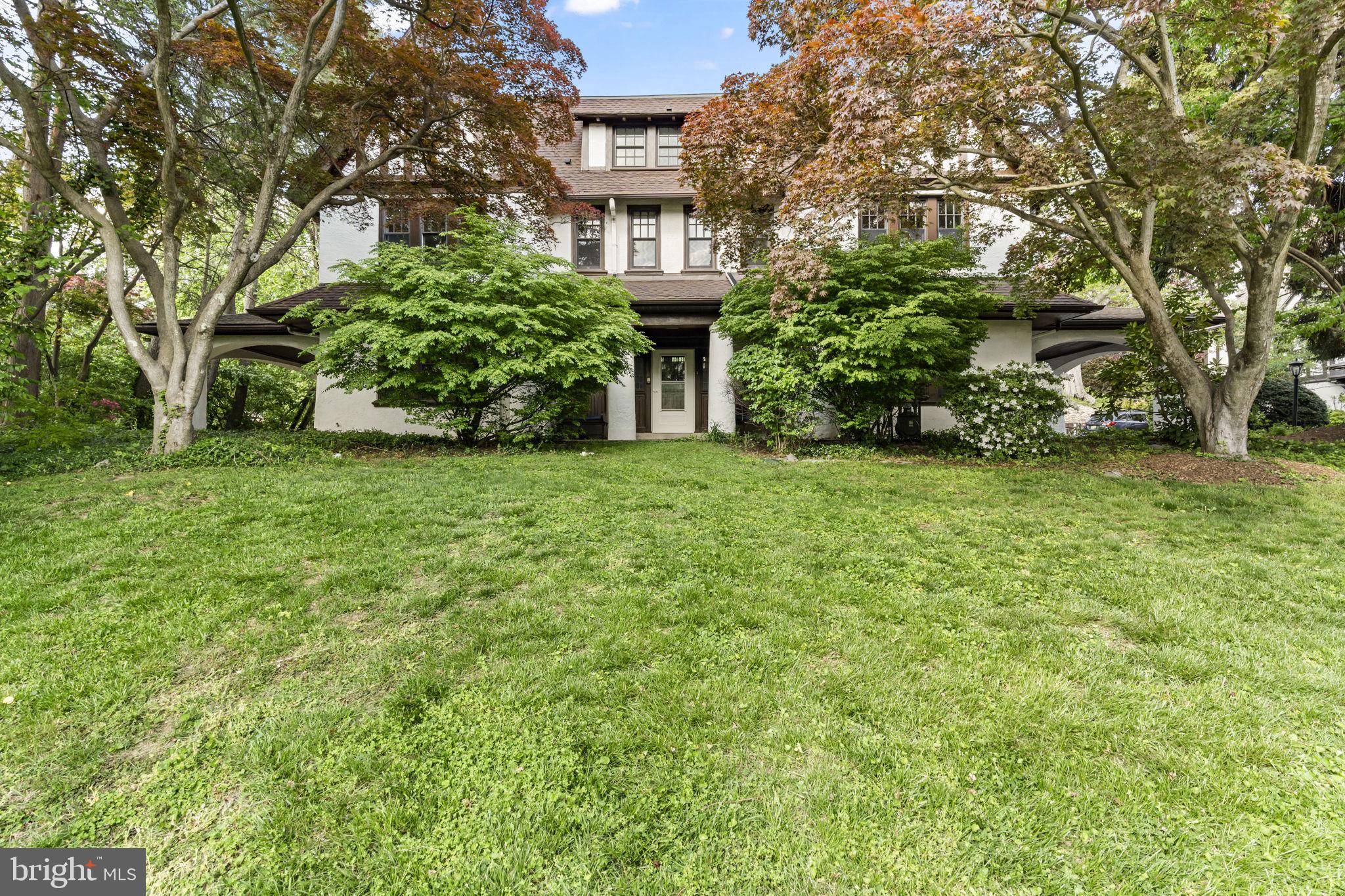 Welcome to your dream home at 1007 Valley Road, located in the charming Philadelphia suburb of Elkins Park. This magnificent Tudor-style residence offers an impressive 6,183 square feet of luxurious living space, set on a sprawling nearly three quarters of an acre lot. With 6 spacious bedrooms and 4.5 well-appointed bathrooms, this home provides ample space for comfort and relaxation. The home is also filled with old-world charm and history, and was designed by Louis Magaziner, a well-known Philadelphia architect.
Stepping inside, you're greeted by the original wood grand foyer that leads you to the formal dining room with a beautiful fireplace with electric insert, perfect for hosting elegant dinners. The home features beautiful hardwood floors throughout, enhancing the classic Tudor architecture. The living room, adorned with a cozy fireplace, offers a serene space for family gatherings. A state-of-the-art kitchen is equipped with a Fisher and Paykel refrigerator, Miele dishwasher and steam oven, GE profile double chamber convection range, hand-painted stone backsplash imported from Italy, and access to the elevator.
For your convenience, the home includes an elevator, central air, and a security system, ensuring both comfort and safety. Pella windows and doors have been added on first and second floors, and the home features a newer water heater, commercial steam boiler, plumbing, electrical, and the list goes on. The expansive basement and attic provide additional storage or recreational space. The six bedrooms ensure every member of the family their own private space, along with plenty of additional rooms throughout the second and third floors for home offices, entertainment spaces, or quiet getaways. The Master Suite features a California-style closet for an organized living experience, along with access to two different primary en-suite bathrooms and a private balcony, an absolutely idyllic setting to enjoy morning coffee or retire to after a long day.
This property seamlessly blends elegance with modern amenities, creating the perfect sanctuary for your lifestyle. In addition to the spacious footprint of the home, the property also features a large, flat space in the rear of the property that could easily be utilized and transformed into a basketball court, tennis court, private garden, or a swimming pool; the options are endless. Don't miss the opportunity to make this exquisite Elkins Park estate home your own.