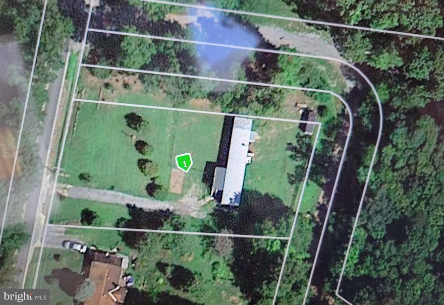 .46 +/- acre lot that has a well and septic in place.  Property currently rented.  Tenant owned mobile home.  Close to I70 for commuting.