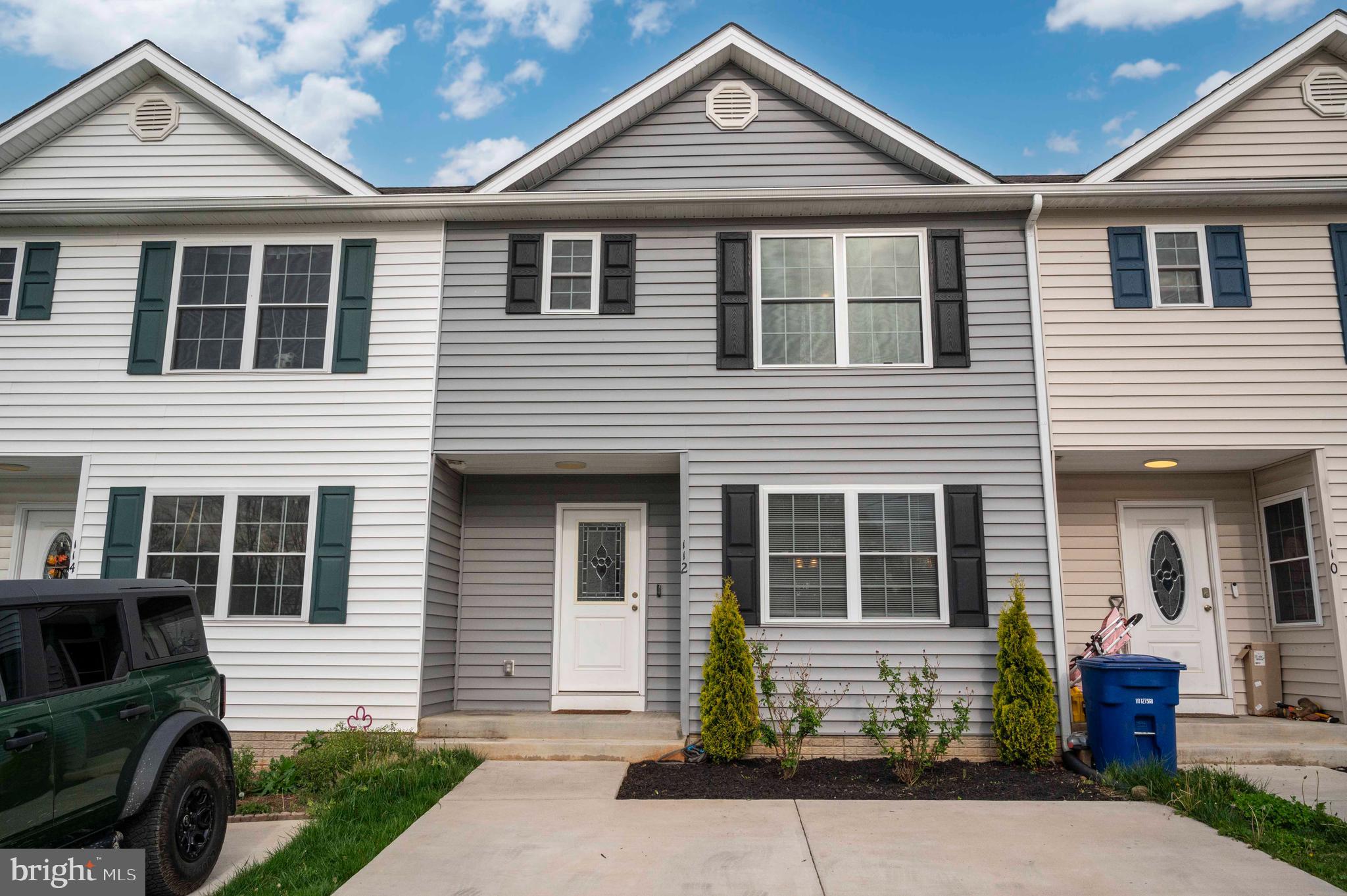 Reduced 10K! Like new and completed in 2022, this beautifully designed three-level townhome offers spacious, upgraded living in a prime in-town location. With Comcast/Xfinity high-speed internet available, this home combines modern convenience with elegant style. The open floor plan creates a bright and airy atmosphere, featuring luxury vinyl plank flooring on the main level, a spacious kitchen with granite countertops, stainless steel appliances, and a dedicated dining area perfect for entertaining. Upstairs, you'll find a large master suite with a full en-suite bath, along with two additional bedrooms and a second full bath. The bathrooms are stylishly tiled, while the bedrooms are carpeted for added comfort. The basement remains unfinished, providing ample opportunity for future expansion or additional living space. A 10' x 10' rear deck offers a great spot to relax outdoors, and the paved driveway with off-street parking adds convenience. With no HOA, this property is just minutes from downtown Front Royal, Eastham Park, the skateboard park, and I-66—making it the perfect blend of location, style, and potential.
