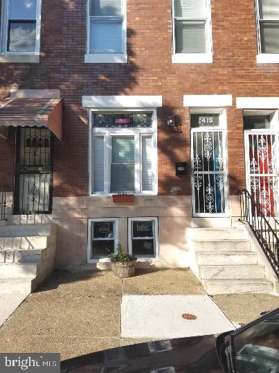Sleek, Modern, with Old School Charm. This stylish 3 Bed 1.5 Bath w/ Den home in Baltimore City adorns exposed brick, original hardwood floors, bedrooms with created closet space, double vanity in main bath, a private covered breakfast balcony off the back bedroom and much more. A Kitchen with quartz counter-top and breakfast bar, all new appliances and a parking pad with privacy fence. Come out to see this gem today!