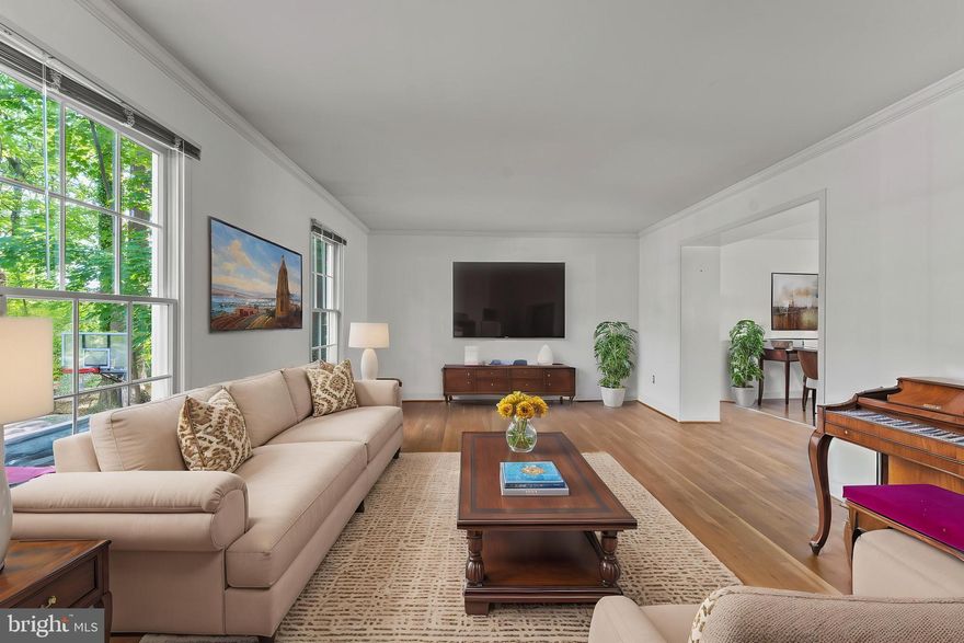 Welcome to this spacious Mt. Washington Colonial where a dramatic two-story foyer embraces you at the door. The main level features generous formal living and dining rooms, a comfortable family room, and a large den—ideal for working from home or quiet retreat.  Upstairs, you'll find well-proportioned bedrooms and abundant closet space. The expansive primary suite boasts two oversized walk-in closets, a soaking tub and dual vanities. Step outside to a large deck overlooking a stunning  three-season perennial garden and  lush plantings —ideal for relaxing or entertaining. The sizable lot has gorgeous mature trees. A two-car garage and an extended driveway provide parking for 6+ vehicles. Soft toned paint throughout makes this home move-in ready.  Don’t miss this rare opportunity in a sought-after location!