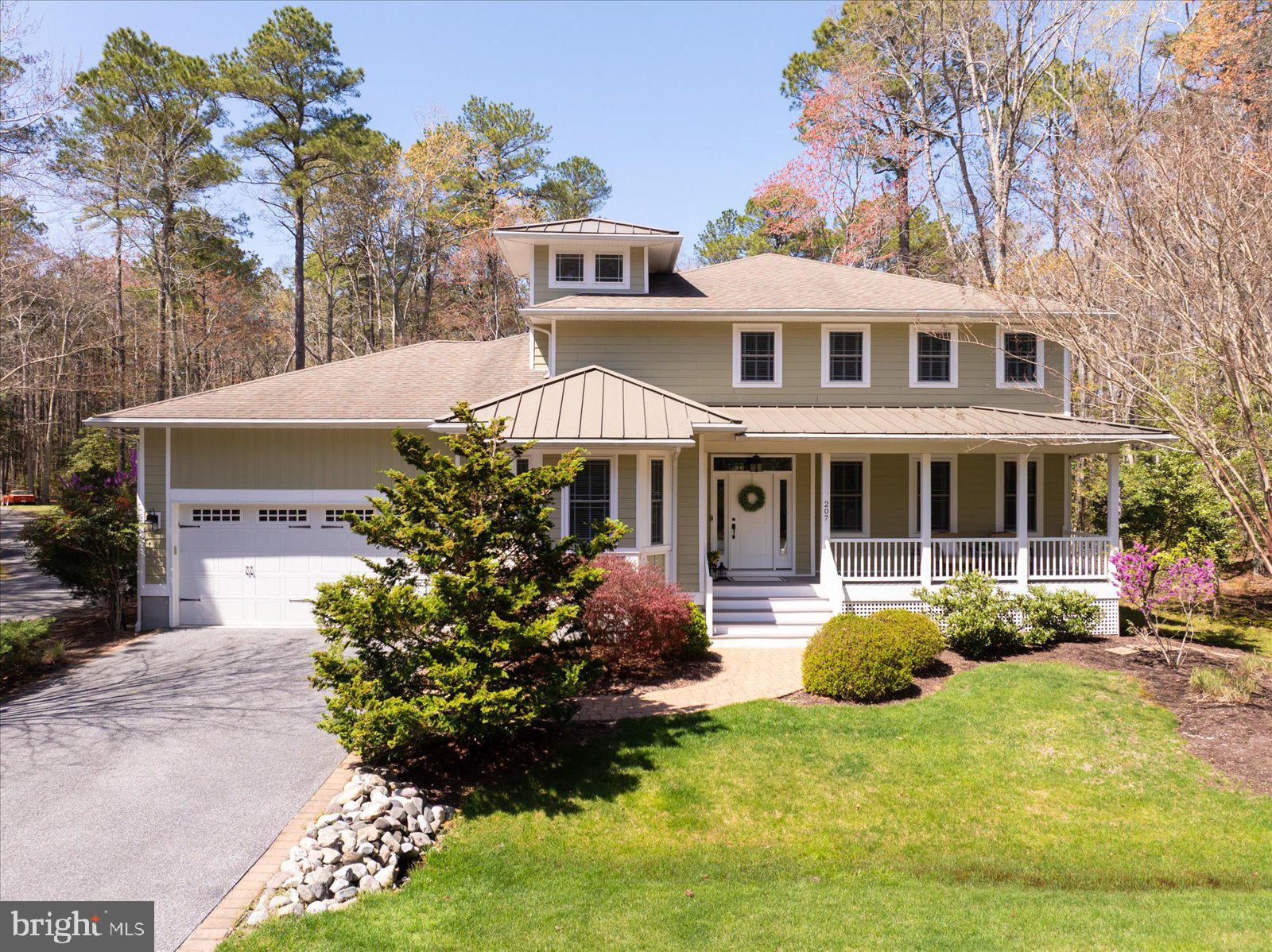 Discover your very own retreat in the heart of Ocean Pines at this custom-crafted masterpiece built by T&G Builders, located in the coveted Whitetail Sanctuary—a secluded enclave known for its estate-style wooded lots and quiet sophistication. A shining example of refined craftsmanship, this 3 (could be 4) bedroom, 2.5 bath home invites you to experience elegant living on Maryland’s Eastern Shore, just minutes from the excitement of Ocean City and the ever-charming Berlin, MD. From its welcoming entry to the airy and spacious great room, every inch of this home has been thoughtfully designed for comfort, connection, and effortless entertaining. The main living area is a light-filled sanctuary with cathedral ceilings, custom tile floors, and a gas fireplace flanked by built-in shelves and an entertainment center. The seamless flow between the living, kitchen, dining and enclosed porch areas creates an inviting atmosphere where family and friends naturally gather. The kitchen is the star of the show, featuring praline maple cabinets, granite countertops, stainless steel appliances, and under-cabinet lighting—all perfectly situated around a large breakfast bar and 8-foot sliding doors that extend your living space outdoors. Retreat to the first-floor primary suite, a luxurious haven complete with a sitting room, expansive walk-in closet, and direct access to the screened porch. The en suite bathroom offers a spa-like experience with a dual vanity and a beautifully tiled walk-in shower. Need a home office or guest space? The main floor includes a flexible room perfect for either. Upstairs, two additional bedrooms share a Jack and Jill bath, while a spacious loft with custom built-ins and cabinetry creates the perfect second living area, game room, or flex space. Additional practical features include a tankless water system, oversized 2-car garage with storage area, 18-ft wide and 8-ft tall door, a Hardie-plank exterior, timber tech decking, irrigation system, walk-in attic storage, and a beautifully designed hardscape patio. A charming garden shed with deck space adds character and functionality for any gardening enthusiast. Set on a 0.55-acre estate-style lot in Ocean Pines, this home offers a rare combination of privacy and convenience. Ocean Pines is more than a neighborhood—it’s a lifestyle. Enjoy access to five swimming pools, two marinas, a Robert Trent Jones Sr.-designed championship golf course, racquet sports, parks, nature trails, and an oceanfront Beach Club in nearby Ocean City. The Yacht Club, farmers markets, and year-round events make this coastal community one of the Eastern Shore’s most coveted destinations.
This is more than just a home—it’s your sanctuary by the sea. Don’t miss your chance to experience life at its finest!