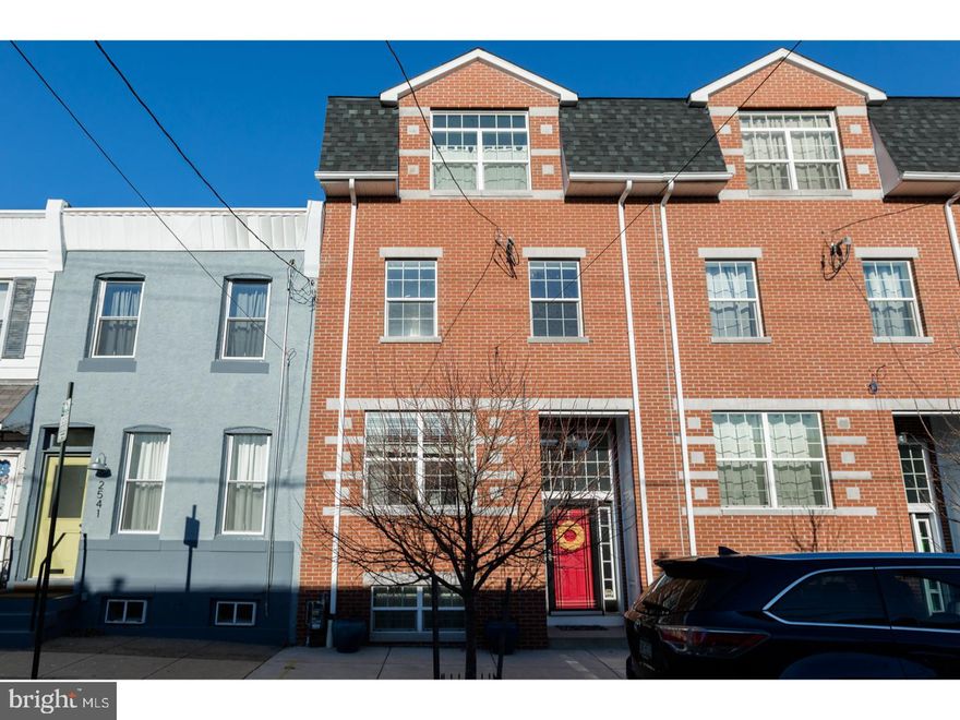 Welcome home to 2543 E Dauphin st! This 5 year young, 3,800 square foot home has it all: three generously sized bedrooms, three and a half bathrooms, a finished basement, beautiful hardwood floors throughout, rear deck & very large patio/yard! Enter into this space to an open floor plan, featuring the living and dining room as well as the gorgeous kitchen with stainless steel appliance package and granite countertops. The first level also includes a 1/2 bathroom. Through the kitchen and outside you'll find the deck and patio; the perfect space for entertaining, grilling, gardening. Venture downstairs to a fully finished basement with 10 foot ceilings for another family/media room. The basement also has plenty of storage, a full bathroom, and provides walk out option for the back patio. The second floor hosts two large bedrooms adjoined by a jack and jill bathroom, as well as a laundry room with side by side washer/dryer. The third floor hosts the private master suite. Here you'll find expansive space for your bedroom along with a sitting room/office and luxurious bathroom with walk in shower, soaking tub (with skyline views!), and two vanities. On this floor you'll also find two, fully customized walk in closets. Super convenient to I 95 & I 76, and walkable to public tran, this home is also close to all the restaurants, retail and entertainment that Fishtown has to offer! 4+ years remaining on tax abatement. We welcome your visit today!
