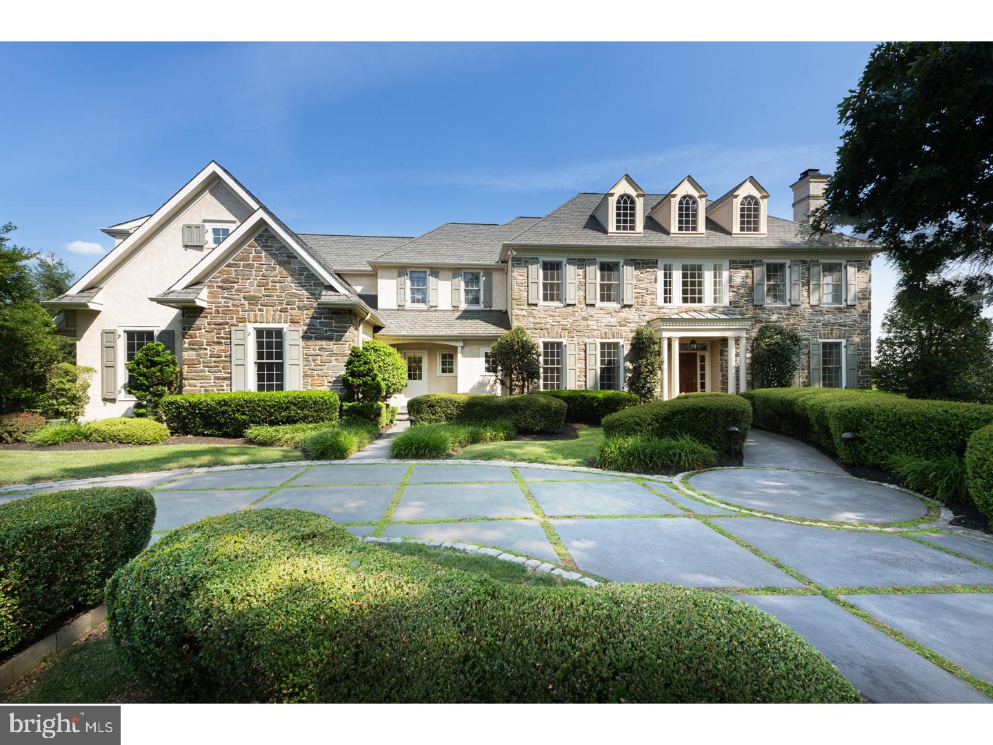 TAXES JUST OFFICIALLY REDUCED BY $11,259/ANNUALLY. One owner since build, this estate presents like the model home it was designed to be by Vaugh/Sautter, Haller & Moser. W/ over $900k in upgrades, this home exceeds wildest dreams. The Halesworth Model at Water Mill located on Springton Lake features Georgian stone facade, innovative floor plan & lavish amenities. The lofty front & rear foyer have matching iron & crystal chandeliers in a rust & gold whitewash finish, originating from a convent near Normandy, France. The 3-1/4" red oak hardwood floors had grain "popped" to darken & enrich walnut stain. Kitchen has only the best appliances & conveniences. Each ornately crafted end of the spacious island sits an open display case surfaced by textured French limestone (Jerusalem gray honed). The cabinetry, concealing a twin Sub-Zero, was crafted from cherry wood w custom paint glaze. Display cabinets equipped w/ glass mullion doors. The Wolf 48" 6 gas burner range blends the latest in appliance design. As you cook, feast your eyes on gorgeous backsplash w tile of Abignon series from Walker Zanger line shaped & glazed by hand. The formal living & dining rooms, perfect for intimate affairs, include custom millwork. The cheerful solarium is great 4 entertaining w drinks. Formal powder room has Lakkista Barbara Barry vanity & white Carrara marble top. The library is full of dignified beauty & warmth with all wood, moldings, trim and wainscoting made from "lyptus" wood, a hybrid of 2 different eucalyptus trees. Lower level features 6x16' Wine room by Baltic Leisure providing highest quality in wine storage, accommodating 1500 bottles. Enjoy the ultimate, HiFi House designed, home cinematic experience rivaling the visual and sound quality of a theater. The spacious master suite has an aura of romantic grandeur with custom designed closets. When outside, enjoy charcoal colored concrete that has appearance of dark slate but offers durability & easy maintenance of concrete. Outdoor dining area features built in Wolf grill & landscaping w deer resistant plantings. The timeless architecture & superb craftsmanship make a lasting investment 2 B enjoyed 365/24/7. Conveniently located to most sought after locations-Downtown Media, Main Line, Center City, Sports Arenas & Phila Airport. Award-Winning Rose Tree Media Schools & multiple private schools in the area like Episcpal Academy & Baldwin. It's a must see and ready for a new owner!