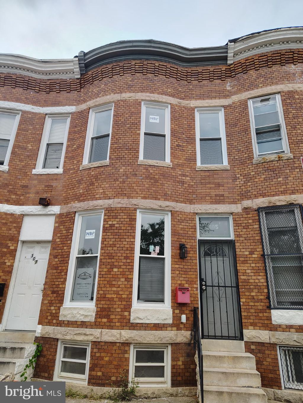 Photo of 305 N Payson Street, BALTIMORE, MD 21223 (MLS # MDBA2185026)