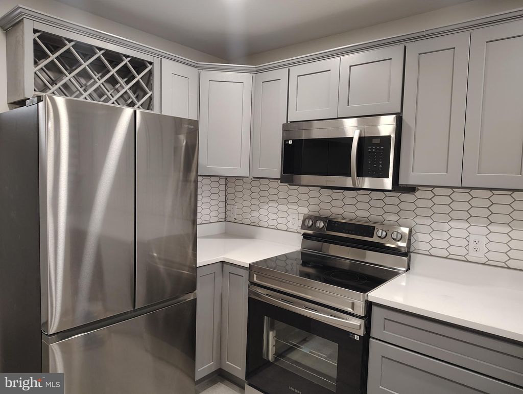 Photo of 305 N Payson Street, BALTIMORE, MD 21223 (MLS # MDBA2185026)